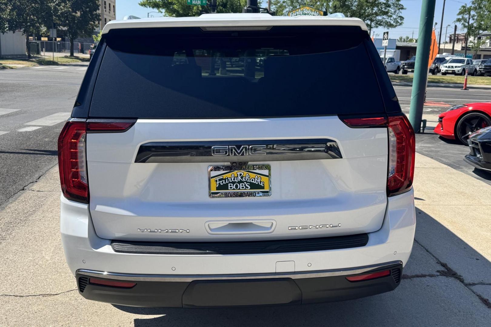 2023 White /Alpine Umber GMC Yukon Denali Ultimate (1GKS2KKT6PR) with an 6 Cyl 3.0 Liter Turbo Diesel engine, Automatic 10 Speed transmission, located at 2304 W. Main St., Boise, ID, 83702, (208) 342-7777, 43.622105, -116.218658 - Rear Entertainment System! Panoramic Sunroof! - Photo#5