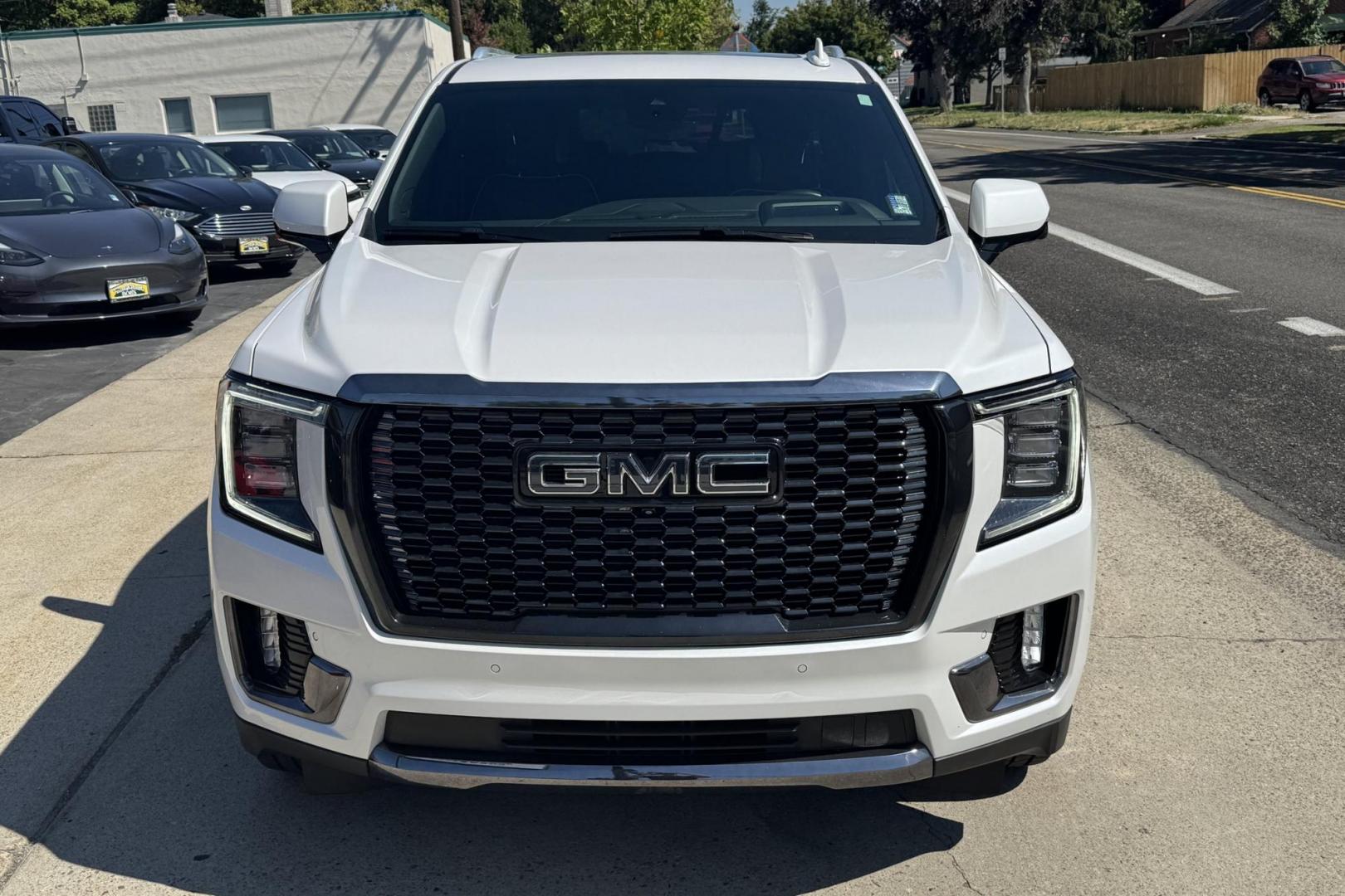 2023 White /Alpine Umber GMC Yukon Denali Ultimate (1GKS2KKT6PR) with an 6 Cyl 3.0 Liter Turbo Diesel engine, Automatic 10 Speed transmission, located at 2304 W. Main St., Boise, ID, 83702, (208) 342-7777, 43.622105, -116.218658 - Rear Entertainment System! Panoramic Sunroof! - Photo#7