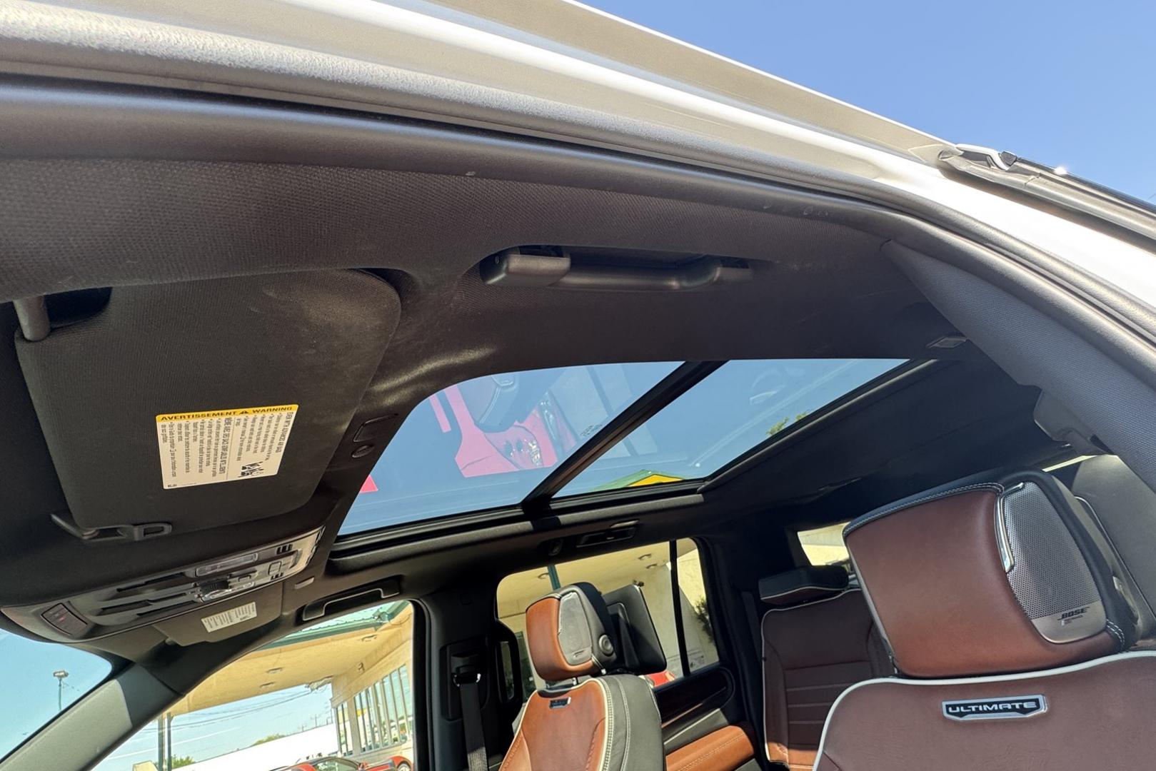 2023 White /Alpine Umber GMC Yukon Denali Ultimate (1GKS2KKT6PR) with an 6 Cyl 3.0 Liter Turbo Diesel engine, Automatic 10 Speed transmission, located at 2304 W. Main St., Boise, ID, 83702, (208) 342-7777, 43.622105, -116.218658 - Rear Entertainment System! Panoramic Sunroof! - Photo#8