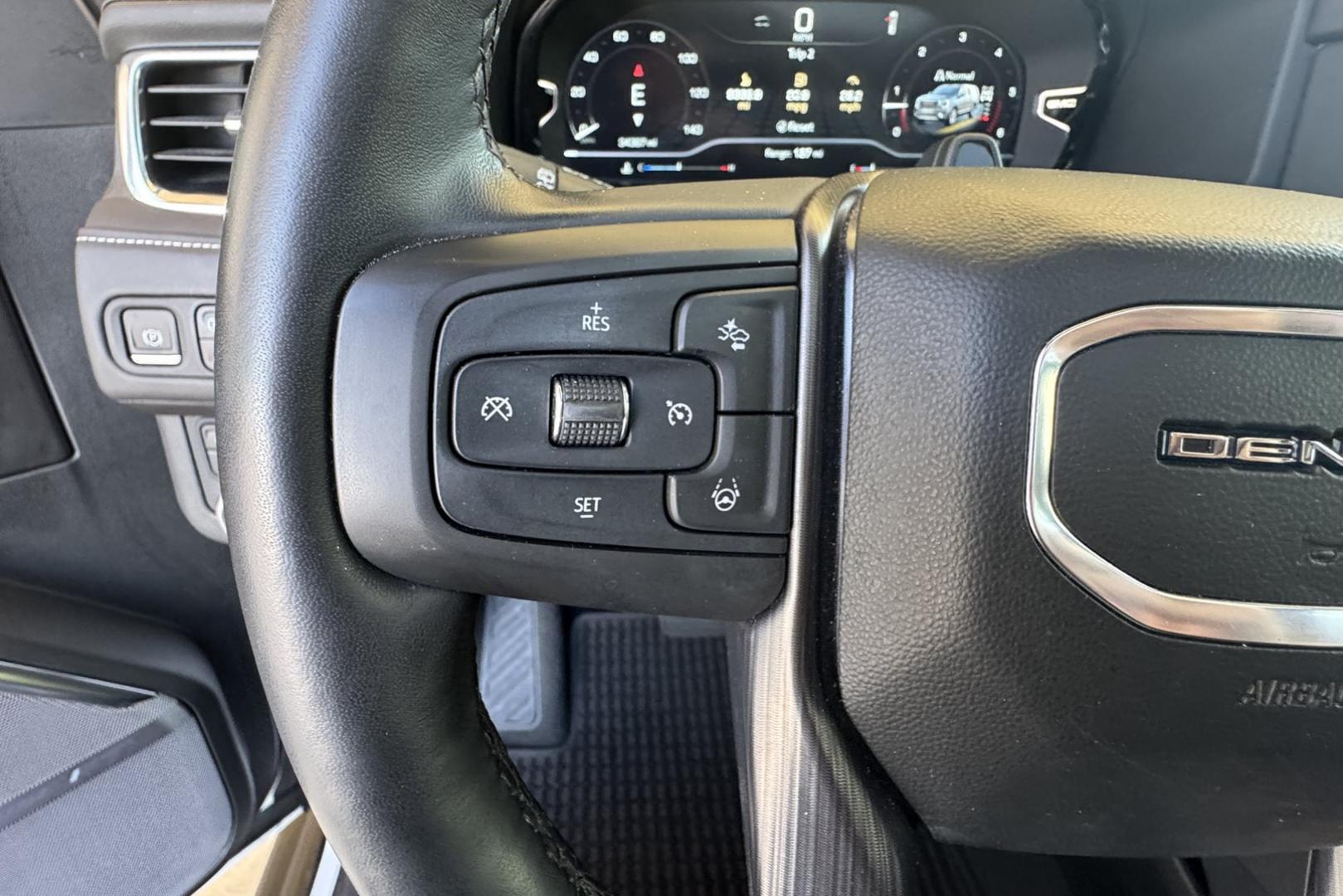 2023 White /Alpine Umber GMC Yukon Denali Ultimate (1GKS2KKT6PR) with an 6 Cyl 3.0 Liter Turbo Diesel engine, Automatic 10 Speed transmission, located at 2304 W. Main St., Boise, ID, 83702, (208) 342-7777, 43.622105, -116.218658 - Rear Entertainment System! Panoramic Sunroof! - Photo#19