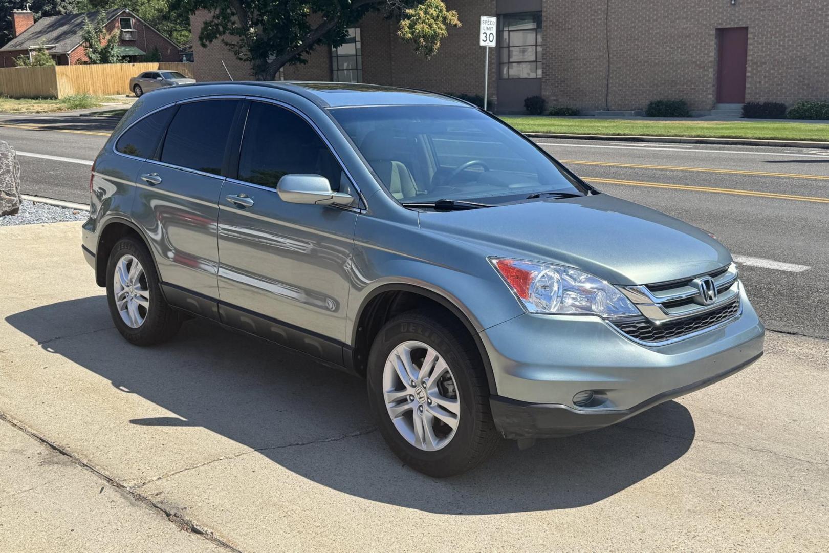 2010 Opal Sage Metallic /Tan Honda CR-V EX-L (5J6RE4H77AL) with an 4 Cyl 2.4 Liter engine, Automatic transmission, located at 2304 W. Main St., Boise, ID, 83702, (208) 342-7777, 43.622105, -116.218658 - Rare Find! 50k Actual Miles! New Tires! Ready To Go! - Photo#2