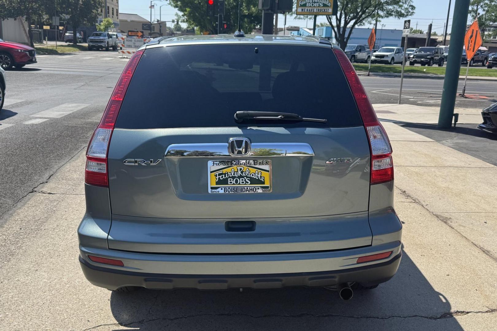 2010 Opal Sage Metallic /Tan Honda CR-V EX-L (5J6RE4H77AL) with an 4 Cyl 2.4 Liter engine, Automatic transmission, located at 2304 W. Main St., Boise, ID, 83702, (208) 342-7777, 43.622105, -116.218658 - Rare Find! 50k Actual Miles! New Tires! Ready To Go! - Photo#1