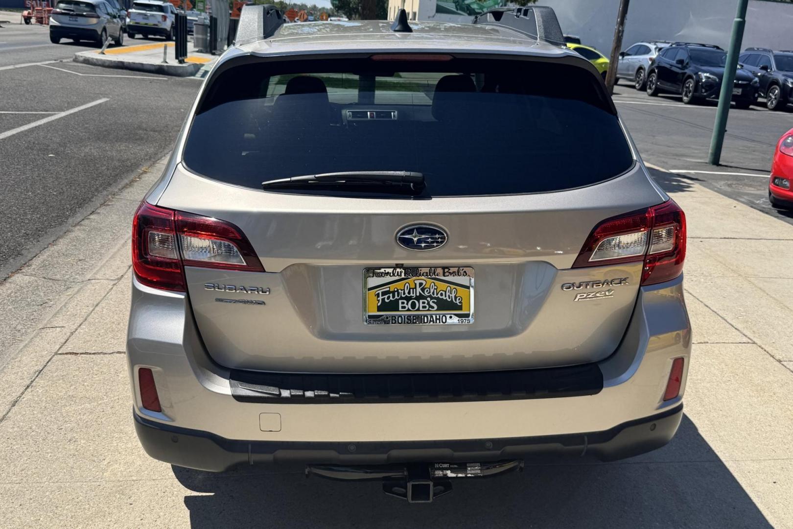 2017 Tungsten Metallic /Tan Subaru Outback Limited (4S4BSANC5H3) with an H4 2.5 Liter engine, Automatic transmission, located at 2304 W. Main St., Boise, ID, 83702, (208) 342-7777, 43.622105, -116.218658 - One Owner Idaho Outback! - Photo#1