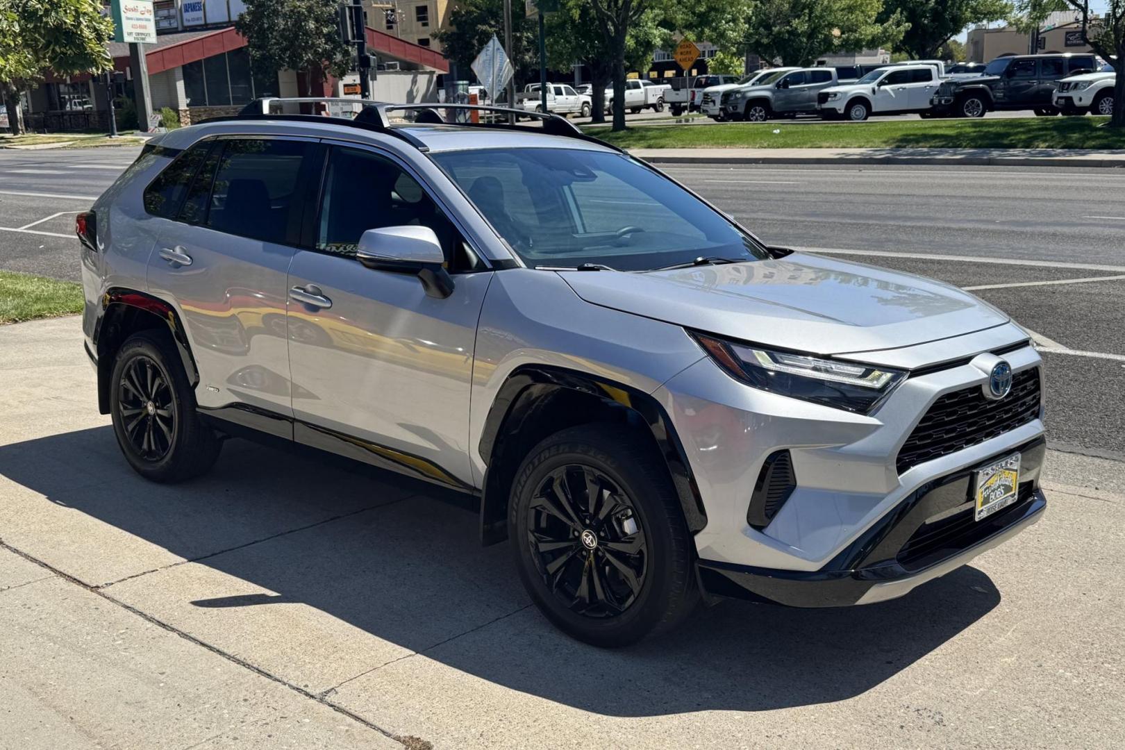 2024 Silver /Black Toyota RAV4 Hybrid SE (2T3T6RFV1RW) with an 4 Cyl 2.5 Liter Hybrid engine, Automatic transmission, located at 2304 W. Main St., Boise, ID, 83702, (208) 342-7777, 43.622105, -116.218658 - Photo#2