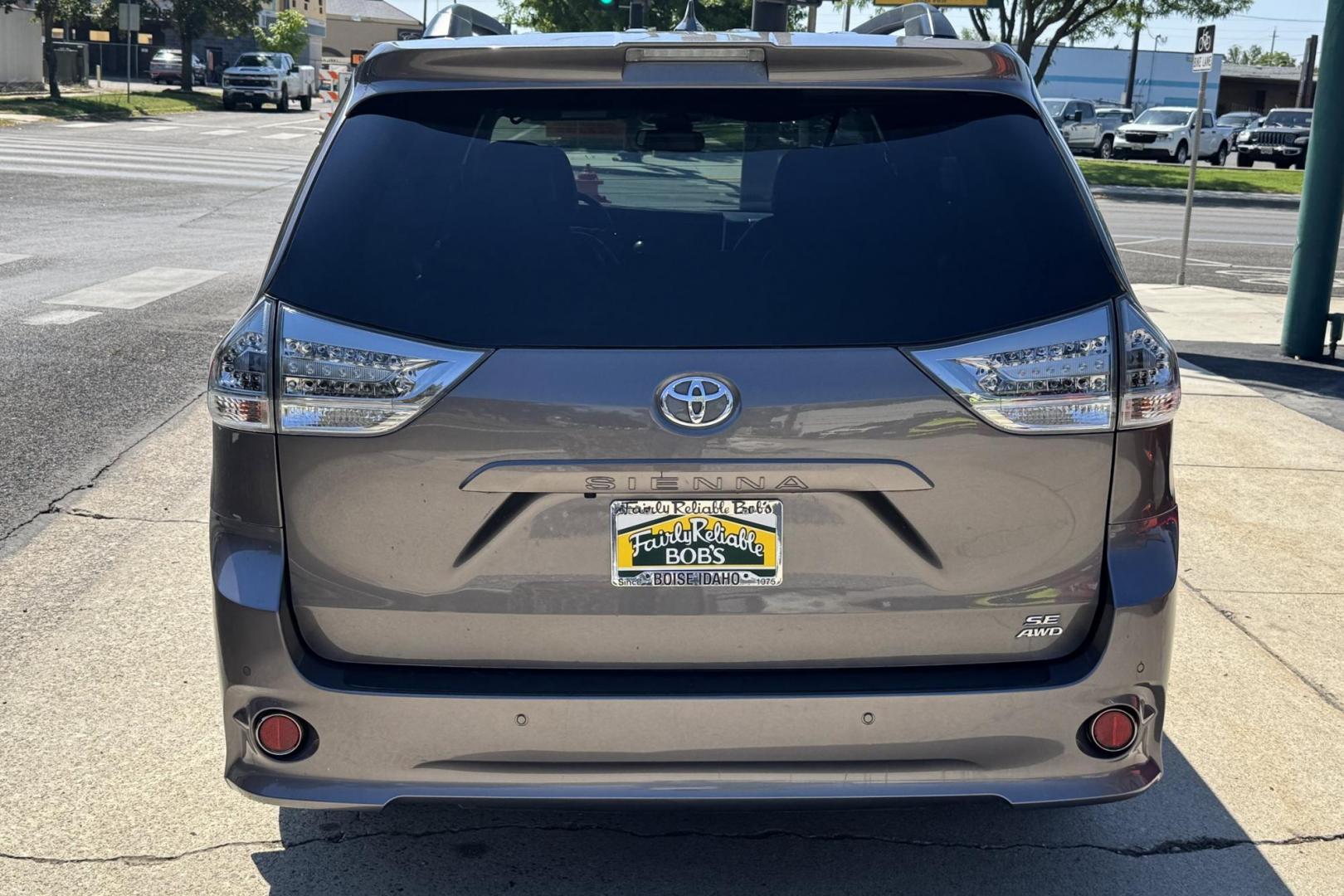 2019 Predawn Mica /Black Toyota Sienna SE Premium (5TDEZ3DC8KS) with an V6 3.5 Liter engine, Automatic 8 Speed transmission, located at 2304 W. Main St., Boise, ID, 83702, (208) 342-7777, 43.622105, -116.218658 - New Tires! Blue Ray Player! All Wheel Drive! Clean One Owner Idaho Car! - Photo#1