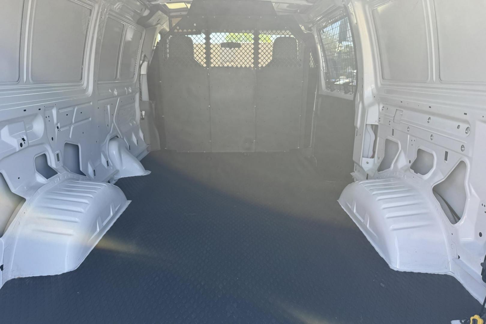 2009 Oxford White /Gray Ford E-150 (1FTNE14W09D) with an V8 4.6 Liter engine, Automatic transmission, located at 2304 W. Main St., Boise, ID, 83702, (208) 342-7777, 43.622105, -116.218658 - Very Clean Commercial Van! - Photo#13