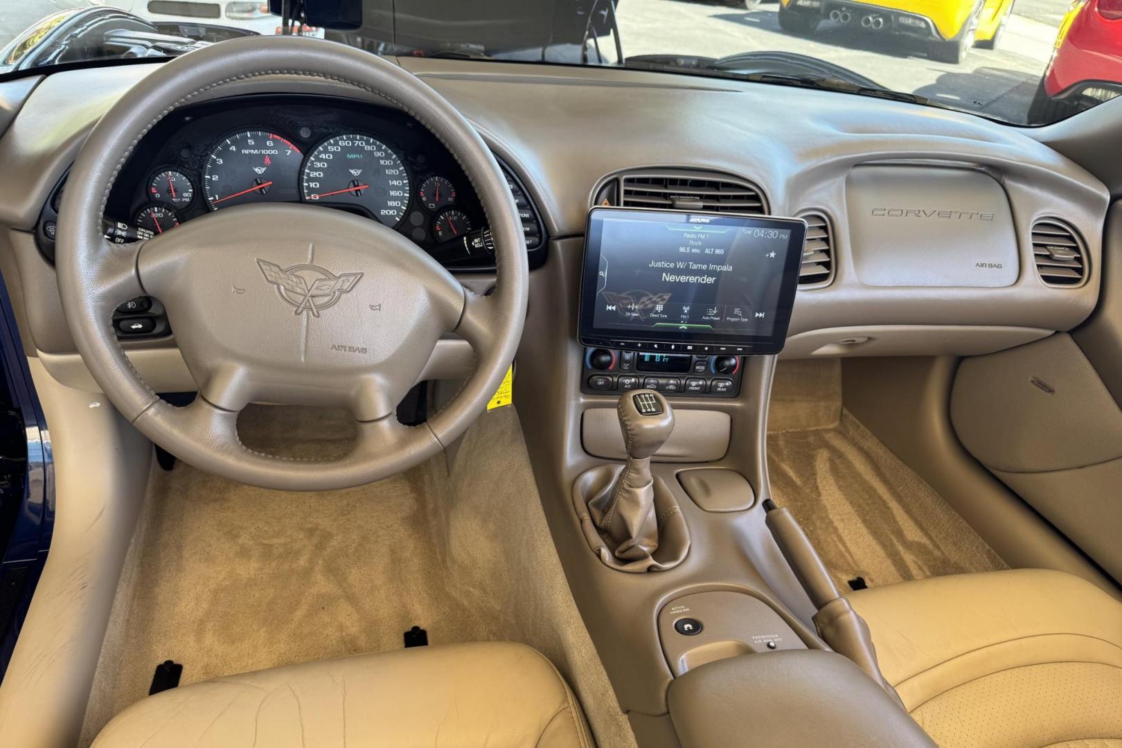 2004 Lemans Blue /Shale Chevrolet Corvette Commemorative Edition (1G1YY32G345) with an V8 5.7 Liter engine, 6 Speed Manual transmission, located at 2304 W. Main St., Boise, ID, 83702, (208) 342-7777, 43.622105, -116.218658 - 24k Miles! Only 2,659 Commemorative Edition Convertibles Were Produced! - Photo#6