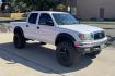 2001 White /Gray Toyota Tacoma SR5 TRD Off Road (5TEHN72N91Z) with an V6 3.4 Liter engine, Automatic transmission, located at 2304 W. Main St., Boise, ID, 83702, (208) 342-7777, 43.622105, -116.218658 - New Tires! Amazing Condition! - Photo#2