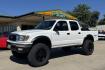 2001 White /Gray Toyota Tacoma SR5 TRD Off Road (5TEHN72N91Z) with an V6 3.4 Liter engine, Automatic transmission, located at 2304 W. Main St., Boise, ID, 83702, (208) 342-7777, 43.622105, -116.218658 - New Tires! Amazing Condition! - Photo#0