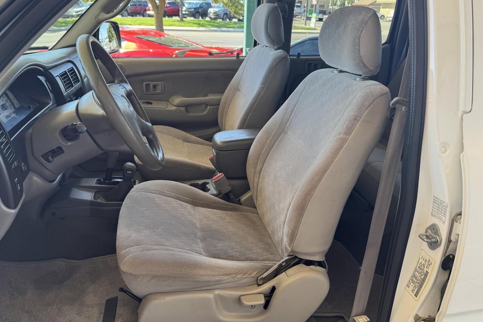 2001 White /Gray Toyota Tacoma SR5 TRD Off Road (5TEHN72N91Z) with an V6 3.4 Liter engine, Automatic transmission, located at 2304 W. Main St., Boise, ID, 83702, (208) 342-7777, 43.622105, -116.218658 - New Tires! Amazing Condition! - Photo#5