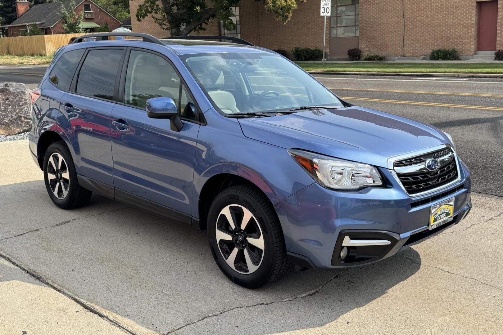 2018 Quartz Blue Pearl /Gray Subaru Forester Premium (JF2SJAGCXJH) with an H4 2.5 Liter engine, Automatic transmission, located at 2304 W. Main St., Boise, ID, 83702, (208) 342-7777, 43.622105, -116.218658 - Clean Low Mileage Forester! - Photo#2