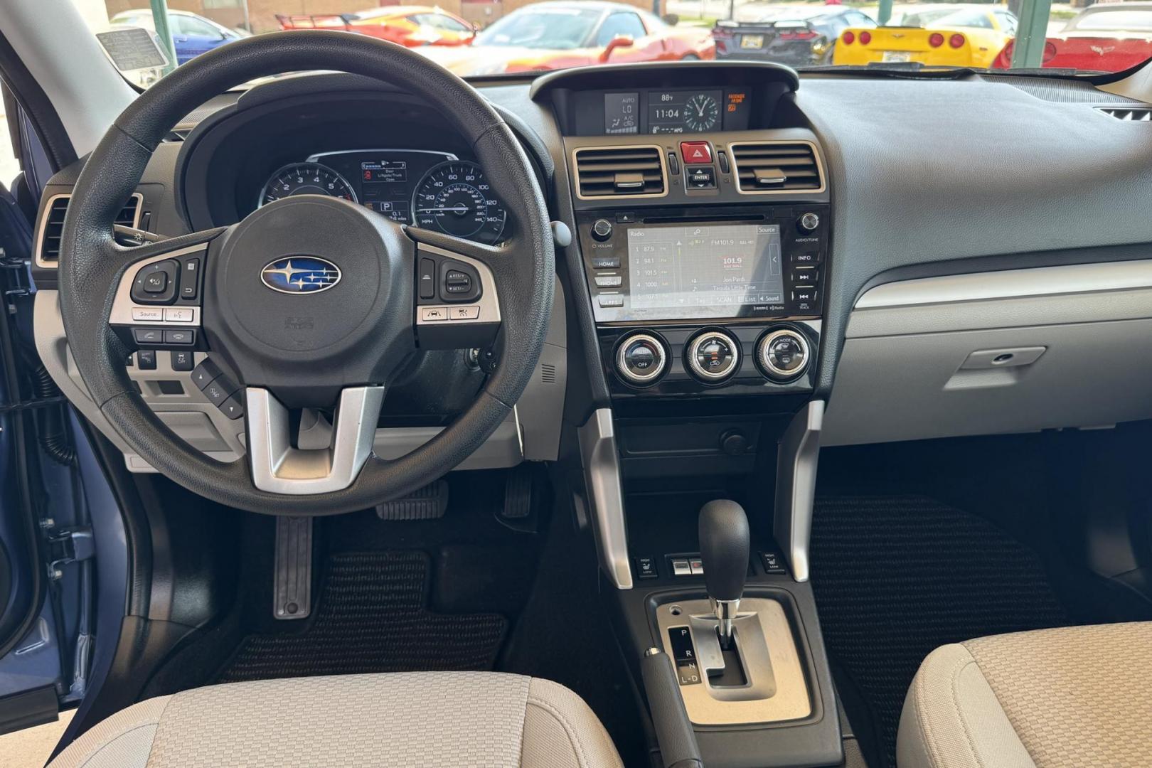 2018 Quartz Blue Pearl /Gray Subaru Forester Premium (JF2SJAGCXJH) with an H4 2.5 Liter engine, Automatic transmission, located at 2304 W. Main St., Boise, ID, 83702, (208) 342-7777, 43.622105, -116.218658 - Clean Low Mileage Forester! - Photo#12