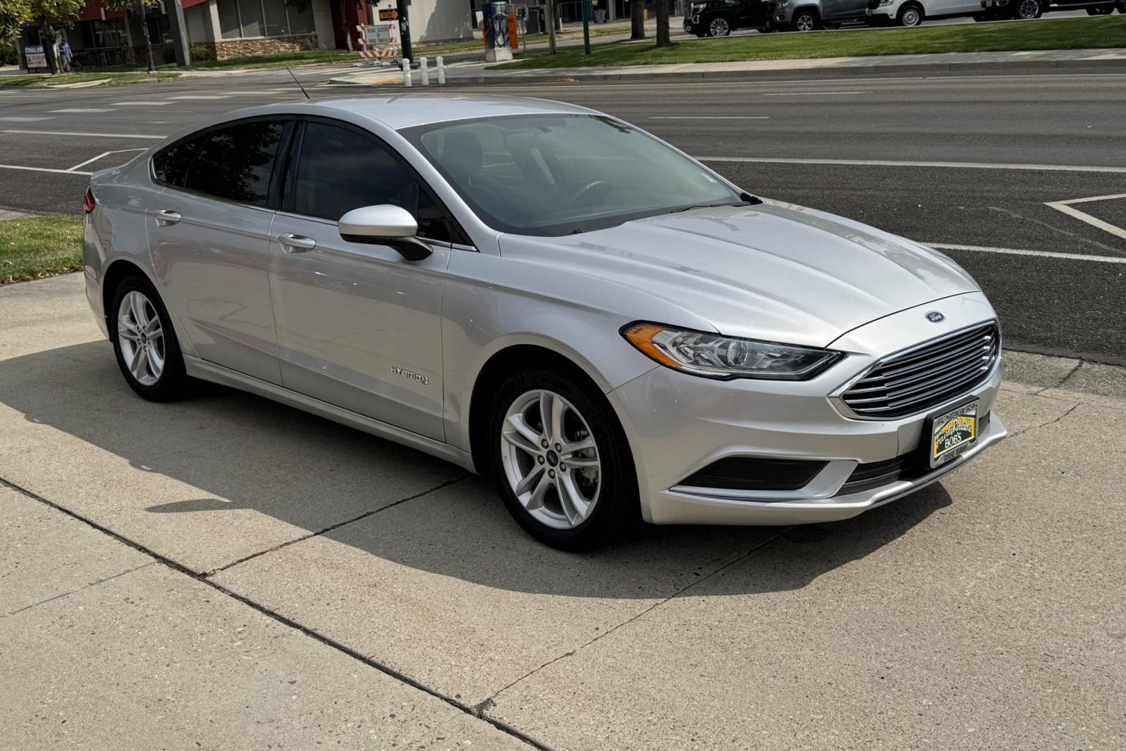 2018 Silver /Gray Ford Fusion (3FA6P0UU5JR) with an 4 Cyl 2.0 Liter Hybrid engine, Automatic transmission, located at 2304 W. Main St., Boise, ID, 83702, (208) 342-7777, 43.622105, -116.218658 - New Tires! Great Fuel Economy! Smooth Ride! - Photo#2
