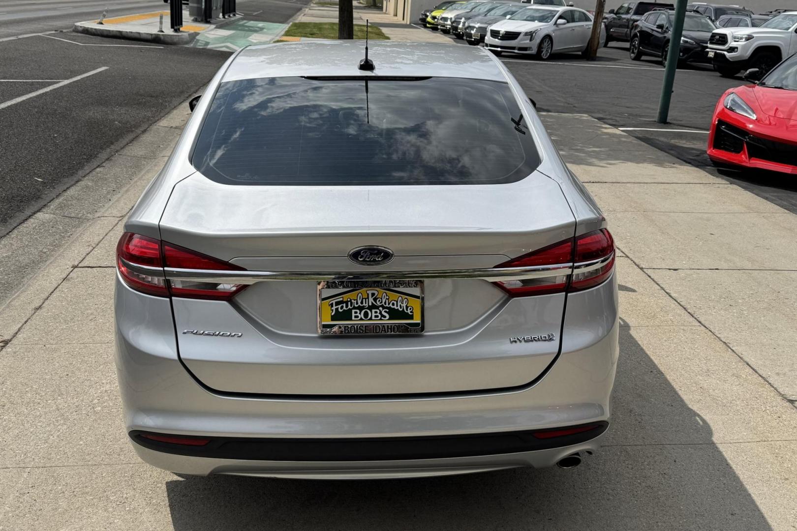 2018 Silver /Gray Ford Fusion (3FA6P0UU5JR) with an 4 Cyl 2.0 Liter Hybrid engine, Automatic transmission, located at 2304 W. Main St., Boise, ID, 83702, (208) 342-7777, 43.622105, -116.218658 - New Tires! Great Fuel Economy! Smooth Ride! - Photo#1