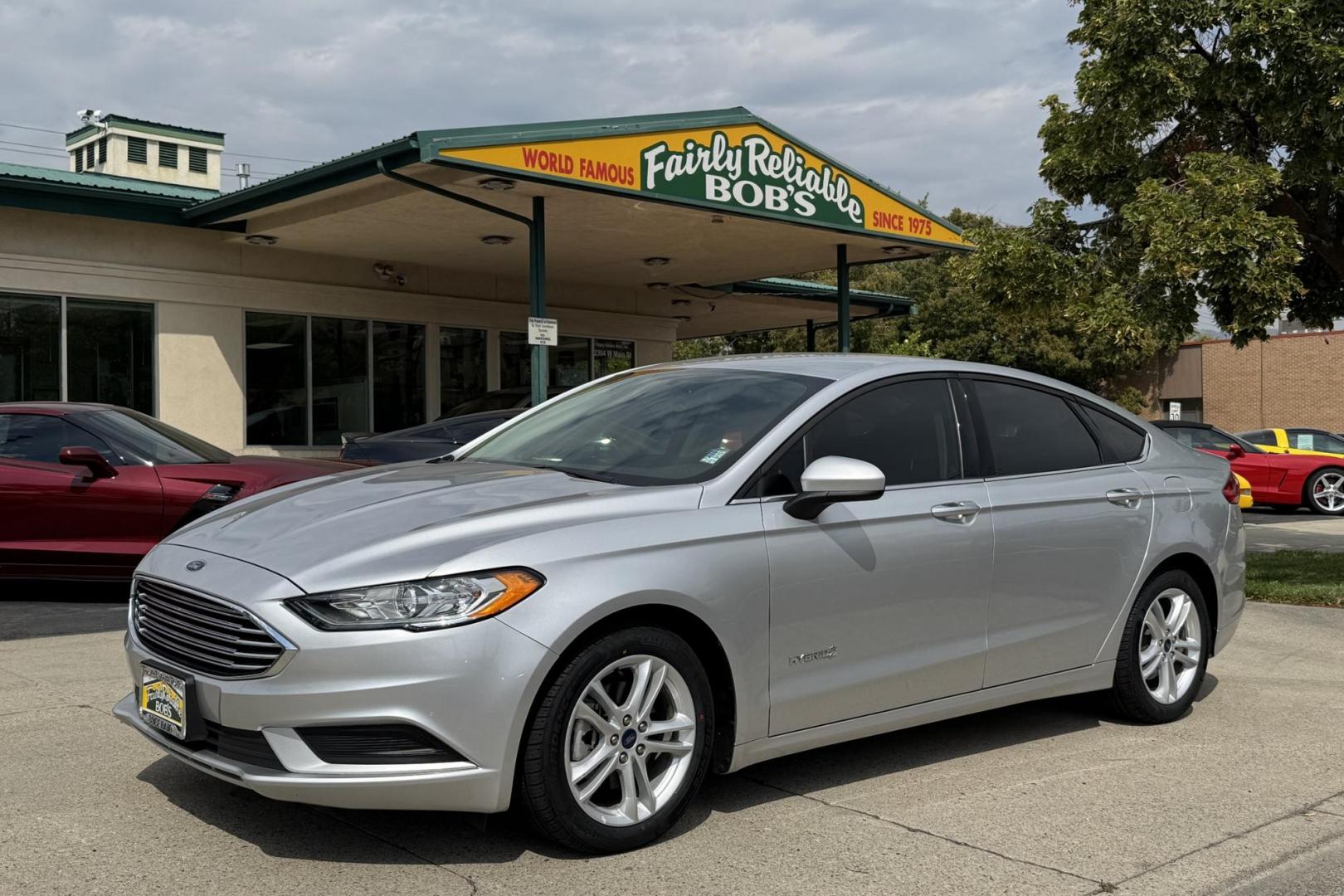 2018 Silver /Gray Ford Fusion (3FA6P0UU5JR) with an 4 Cyl 2.0 Liter Hybrid engine, Automatic transmission, located at 2304 W. Main St., Boise, ID, 83702, (208) 342-7777, 43.622105, -116.218658 - New Tires! Great Fuel Economy! Smooth Ride! - Photo#0