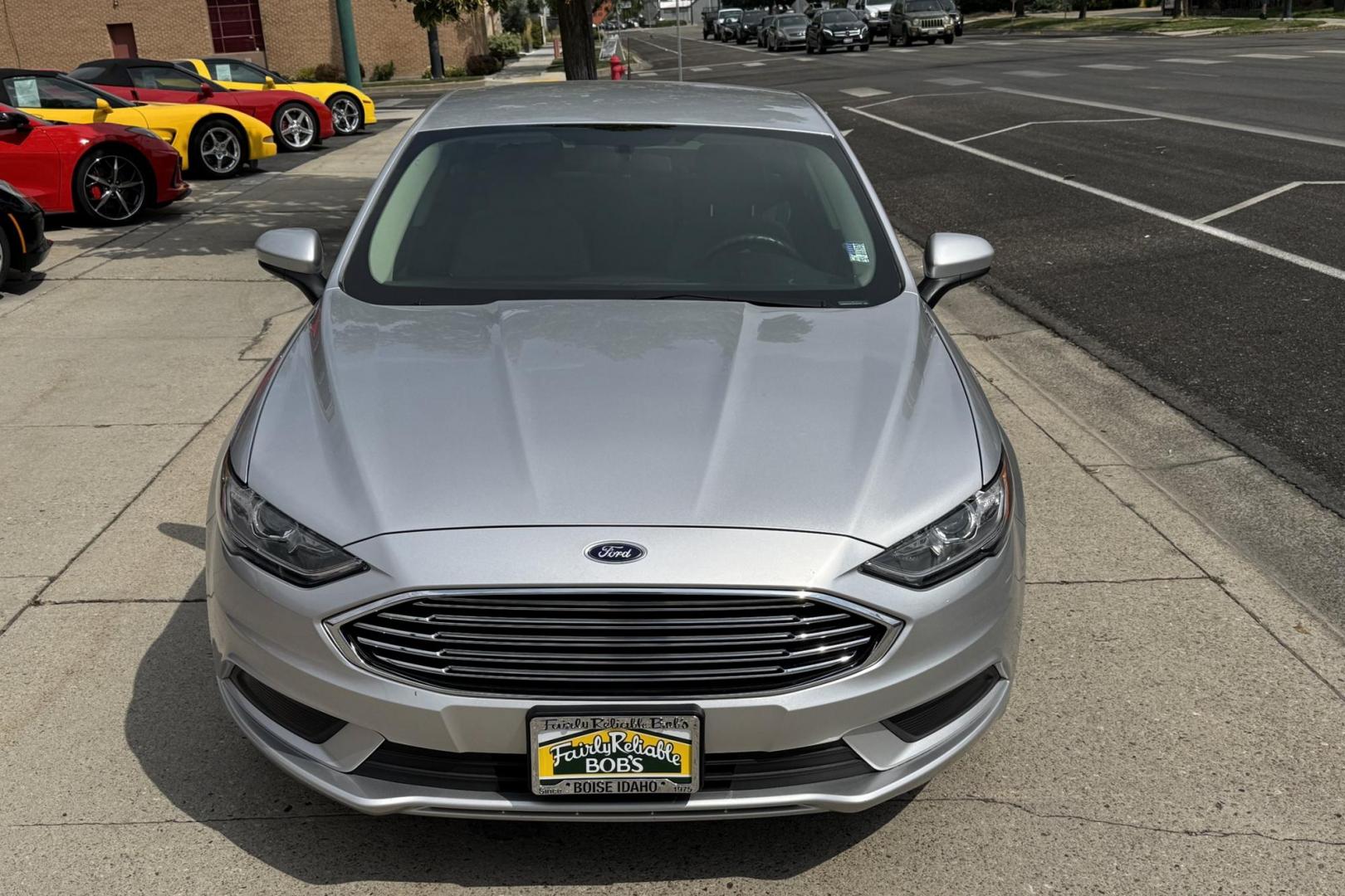 2018 Silver /Gray Ford Fusion (3FA6P0UU5JR) with an 4 Cyl 2.0 Liter Hybrid engine, Automatic transmission, located at 2304 W. Main St., Boise, ID, 83702, (208) 342-7777, 43.622105, -116.218658 - New Tires! Great Fuel Economy! Smooth Ride! - Photo#3