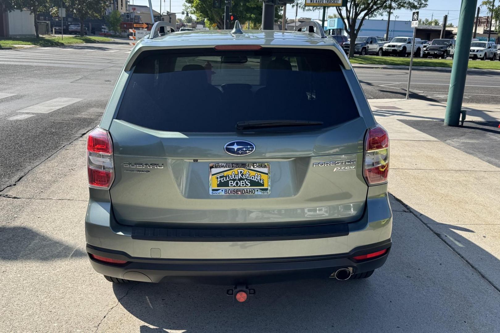 2016 Jasmine Green Metallic /Platinum Leather Subaru Forester Touring (JF2SJAXC7GH) with an H4 2.5 Liter engine, Automatic transmission, located at 2304 W. Main St., Boise, ID, 83702, (208) 342-7777, 43.622105, -116.218658 - Highly Optioned And Low Mileage Forester Touring! New Tires Too! - Photo#1