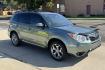 2016 Jasmine Green Metallic /Platinum Leather Subaru Forester Touring (JF2SJAXC7GH) with an H4 2.5 Liter engine, Automatic transmission, located at 2304 W. Main St., Boise, ID, 83702, (208) 342-7777, 43.622105, -116.218658 - Highly Optioned And Low Mileage Forester Touring! New Tires Too! - Photo#2
