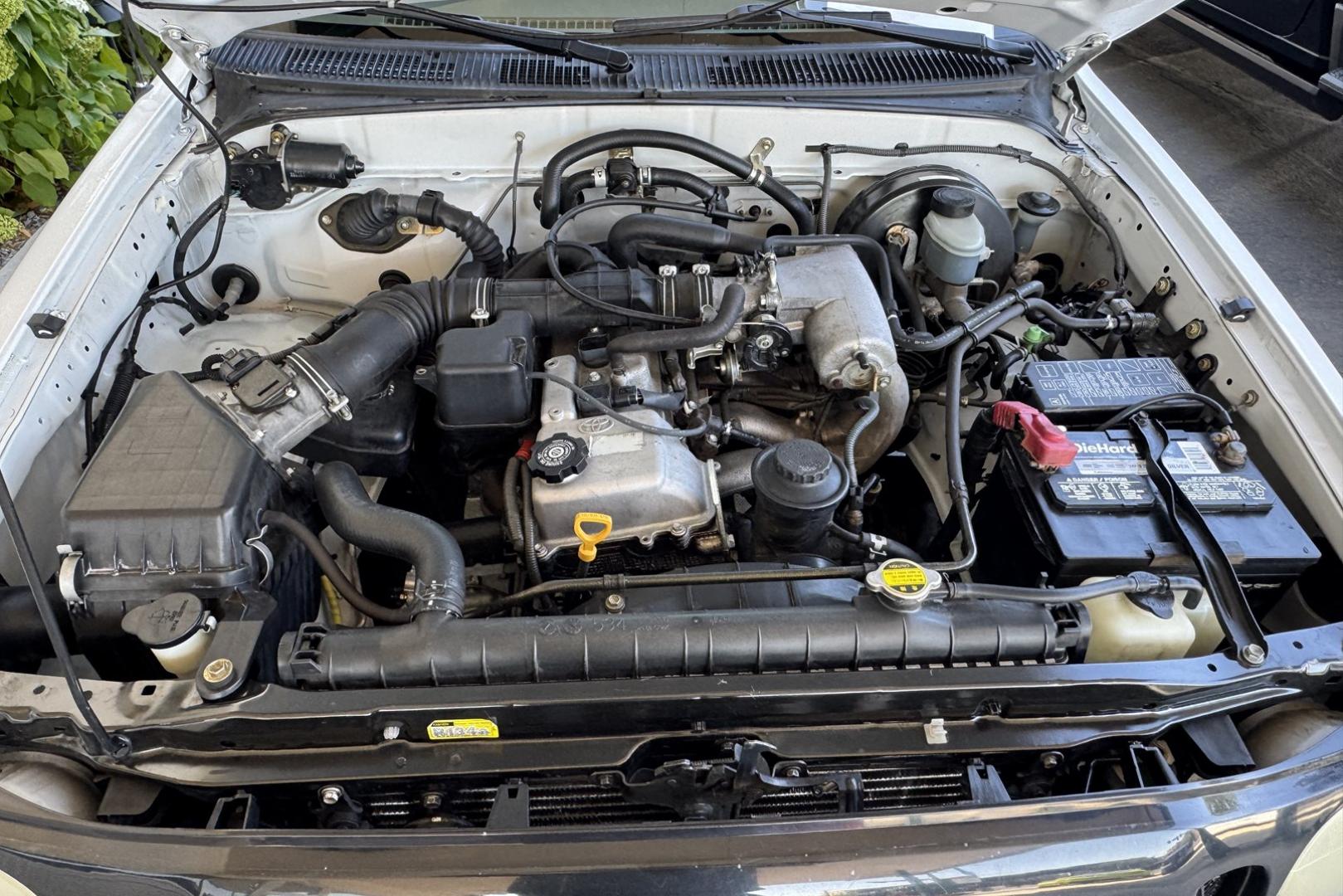 2002 White /Tan Toyota Tacoma (5TENL42N12Z) with an 2.4L L4 DOHC 16V engine, 5 Speed transmission, located at 2304 W. Main St., Boise, ID, 83702, (208) 342-7777, 43.622105, -116.218658 - Timeless And Reliable Tacoma! - Photo#7