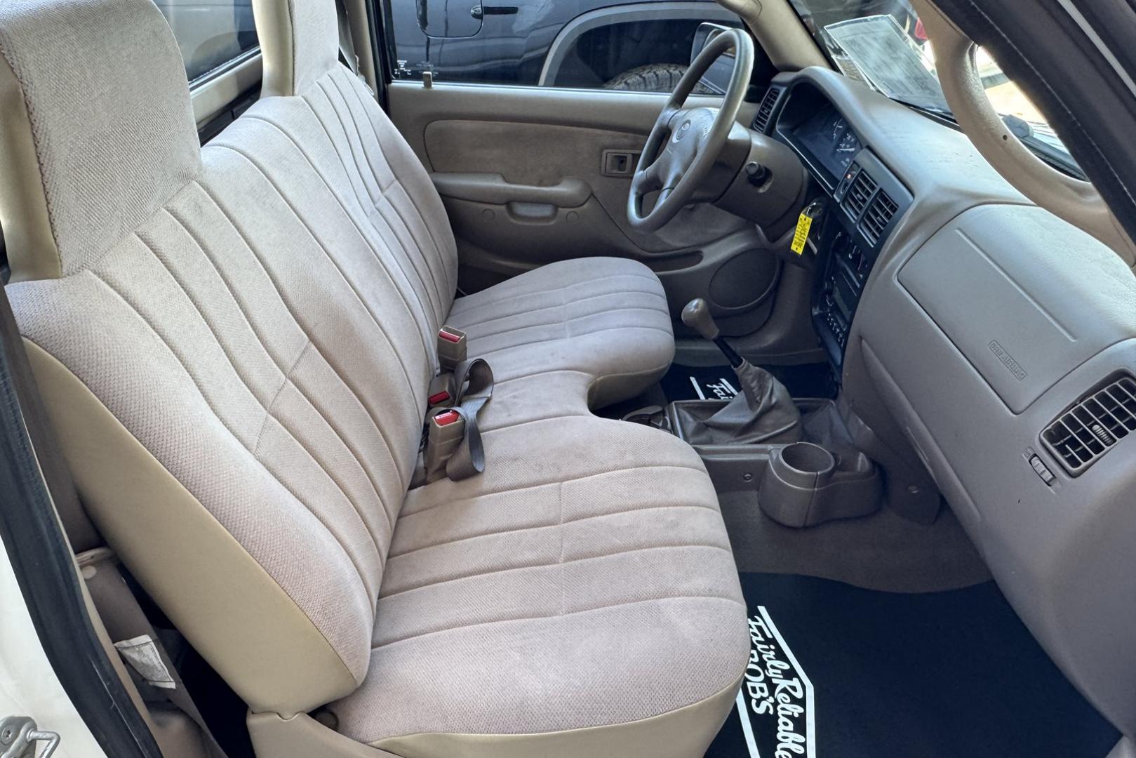 2002 White /Tan Toyota Tacoma (5TENL42N12Z) with an 2.4L L4 DOHC 16V engine, 5 Speed transmission, located at 2304 W. Main St., Boise, ID, 83702, (208) 342-7777, 43.622105, -116.218658 - Timeless And Reliable Tacoma! - Photo#9