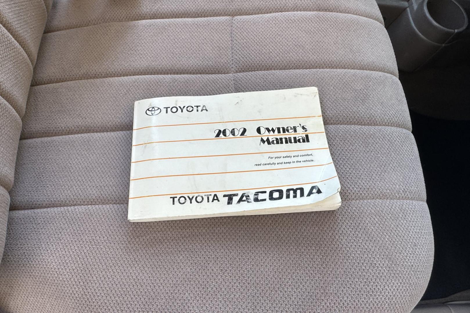 2002 White /Tan Toyota Tacoma (5TENL42N12Z) with an 2.4L L4 DOHC 16V engine, 5 Speed transmission, located at 2304 W. Main St., Boise, ID, 83702, (208) 342-7777, 43.622105, -116.218658 - Timeless And Reliable Tacoma! - Photo#11