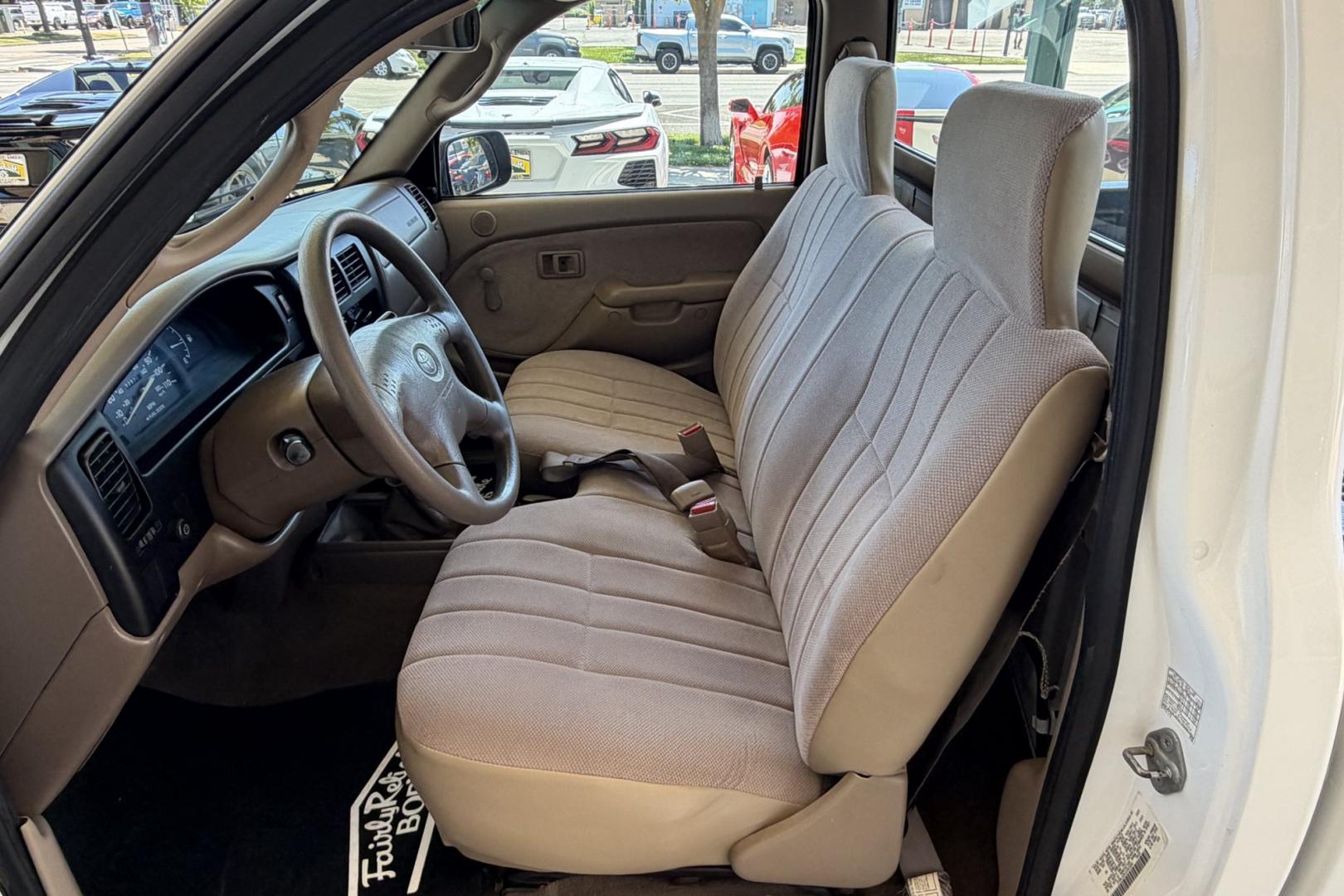 2002 White /Tan Toyota Tacoma (5TENL42N12Z) with an 4 Cyl 2.4 Liter engine, 5 Speed transmission, located at 2304 W. Main St., Boise, ID, 83702, (208) 342-7777, 43.622105, -116.218658 - Timeless And Reliable Tacoma!- Photo#5