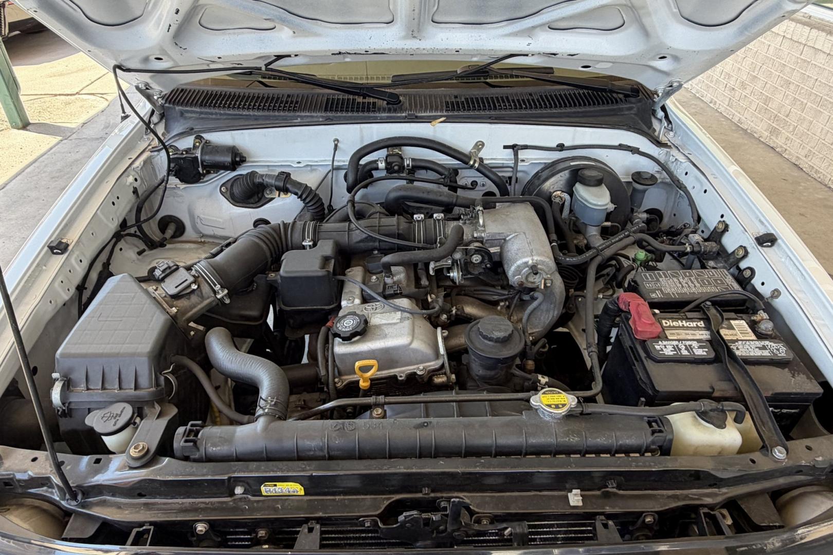 2002 White /Tan Toyota Tacoma (5TENL42N12Z) with an 4 Cyl 2.4 Liter engine, 5 Speed transmission, located at 2304 W. Main St., Boise, ID, 83702, (208) 342-7777, 43.622105, -116.218658 - Timeless And Reliable Tacoma!- Photo#8