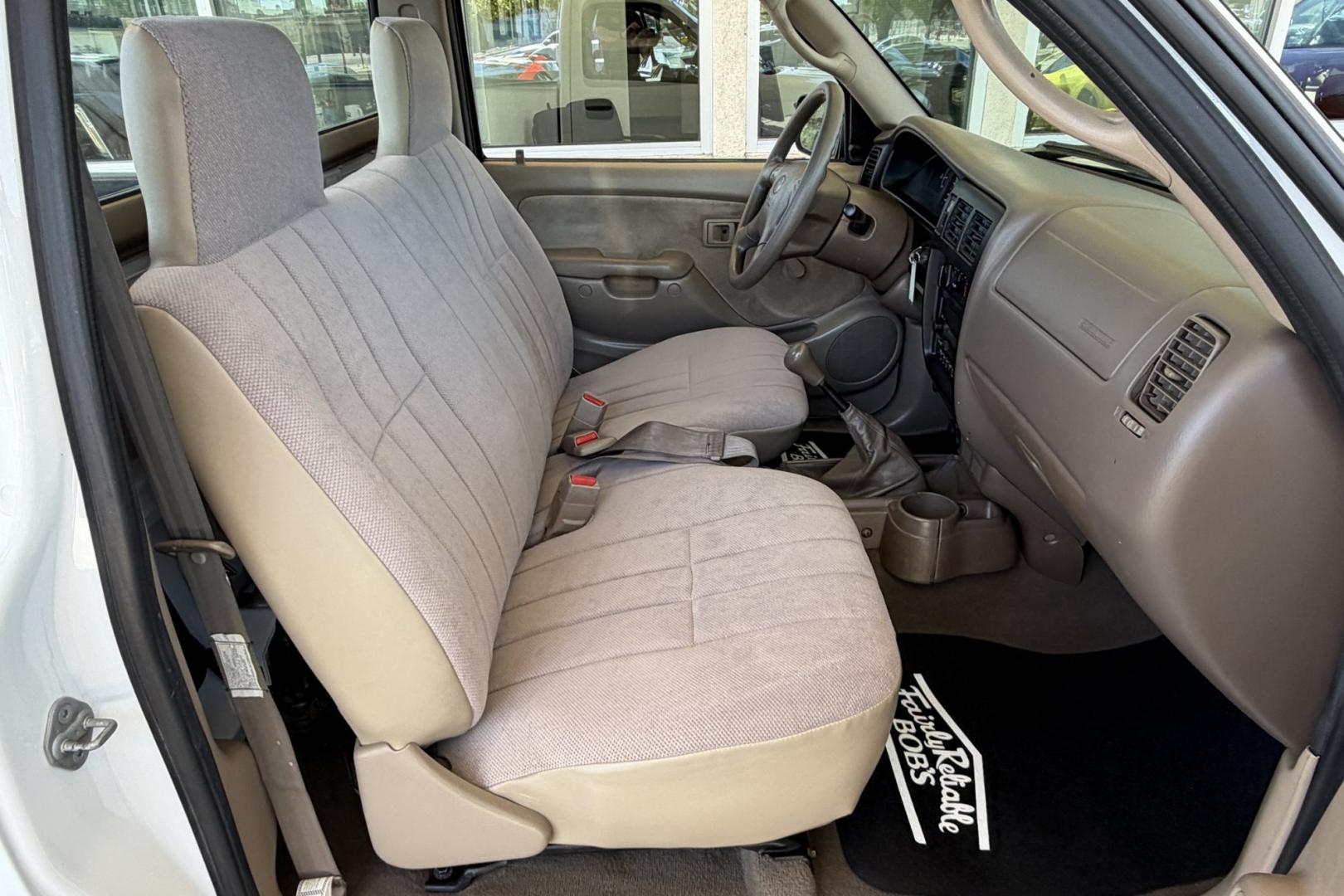 2002 White /Tan Toyota Tacoma (5TENL42N12Z) with an 4 Cyl 2.4 Liter engine, 5 Speed transmission, located at 2304 W. Main St., Boise, ID, 83702, (208) 342-7777, 43.622105, -116.218658 - Timeless And Reliable Tacoma!- Photo#9