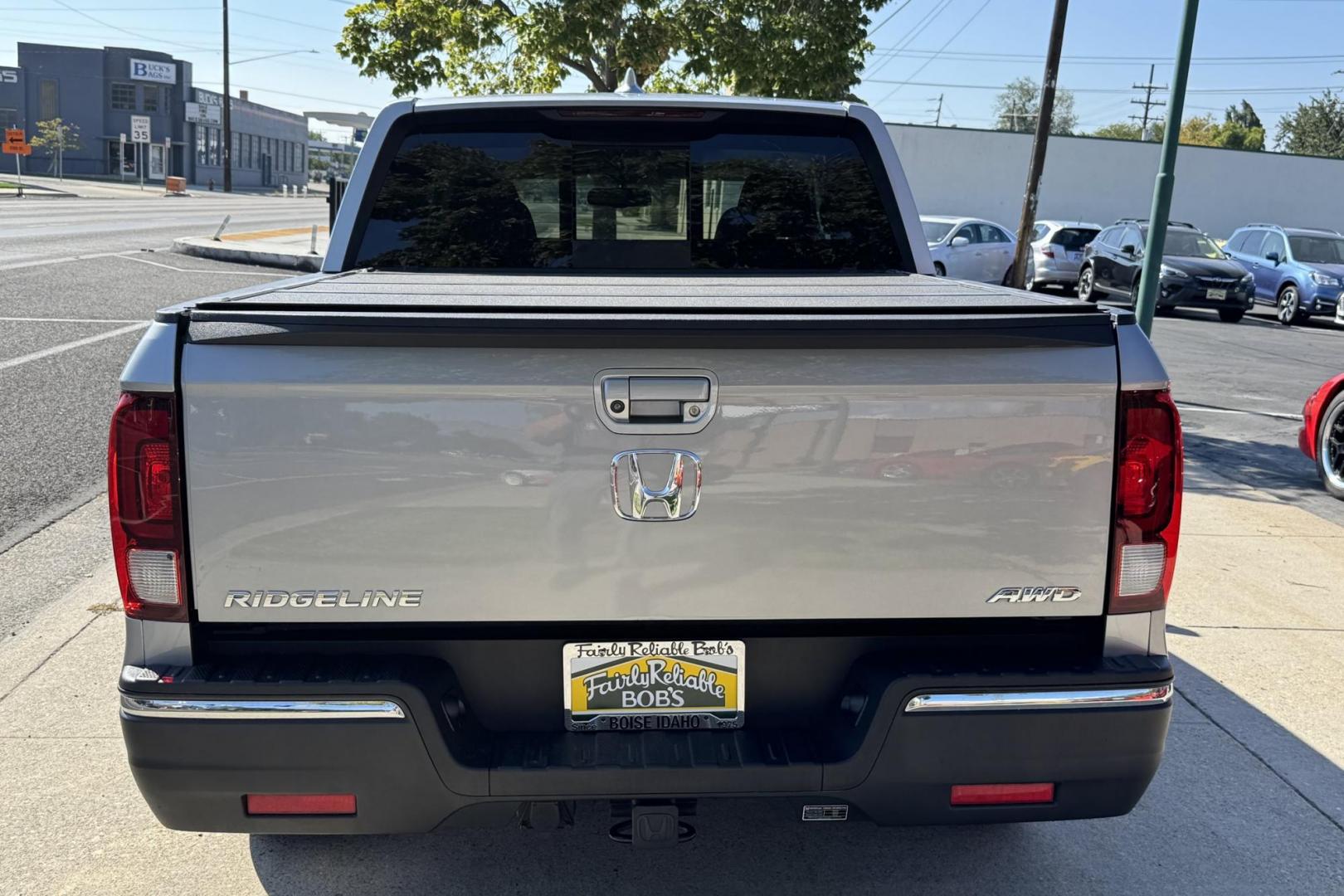 2019 Silver /Black Honda Ridgeline RTL-T (5FPYK3F67KB) with an V6 3.5 Liter engine, Automatic 6 Speed transmission, located at 2304 W. Main St., Boise, ID, 83702, (208) 342-7777, 43.622105, -116.218658 - Photo#1