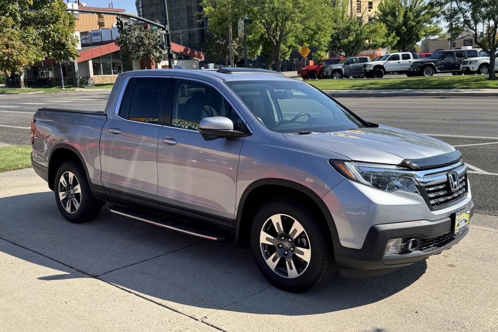 2019 Silver /Black Honda Ridgeline RTL-T (5FPYK3F67KB) with an V6 3.5 Liter engine, Automatic 6 Speed transmission, located at 2304 W. Main St., Boise, ID, 83702, (208) 342-7777, 43.622105, -116.218658 - Photo#2