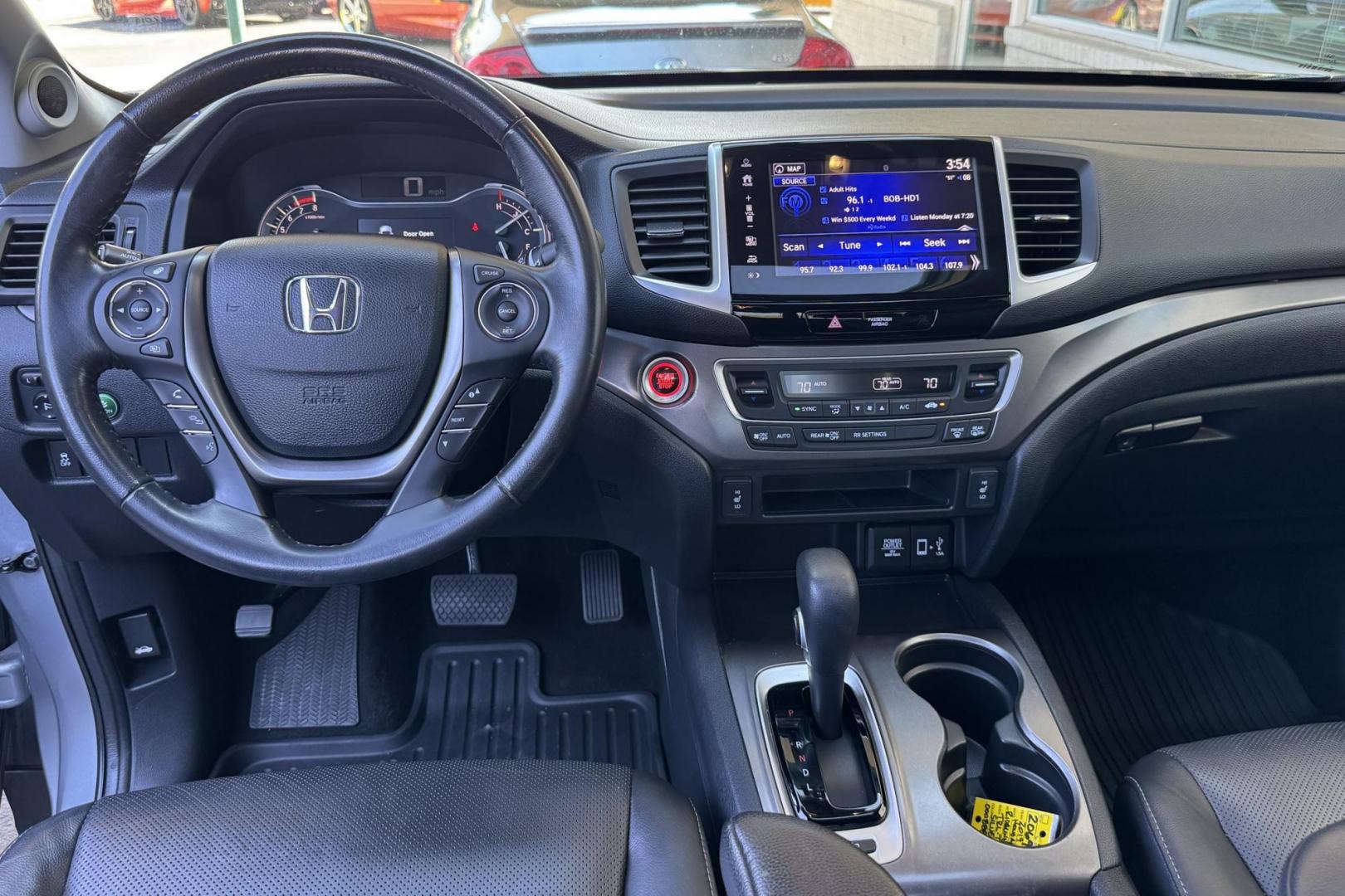2019 Silver /Black Honda Ridgeline RTL-T (5FPYK3F67KB) with an V6 3.5 Liter engine, Automatic 6 Speed transmission, located at 2304 W. Main St., Boise, ID, 83702, (208) 342-7777, 43.622105, -116.218658 - Photo#11