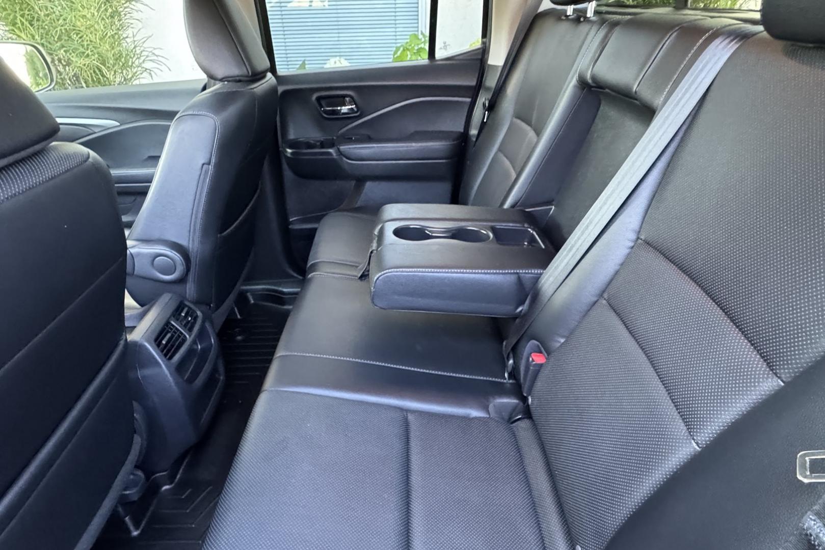 2019 Silver /Black Honda Ridgeline RTL-T (5FPYK3F67KB) with an V6 3.5 Liter engine, Automatic 6 Speed transmission, located at 2304 W. Main St., Boise, ID, 83702, (208) 342-7777, 43.622105, -116.218658 - Photo#12