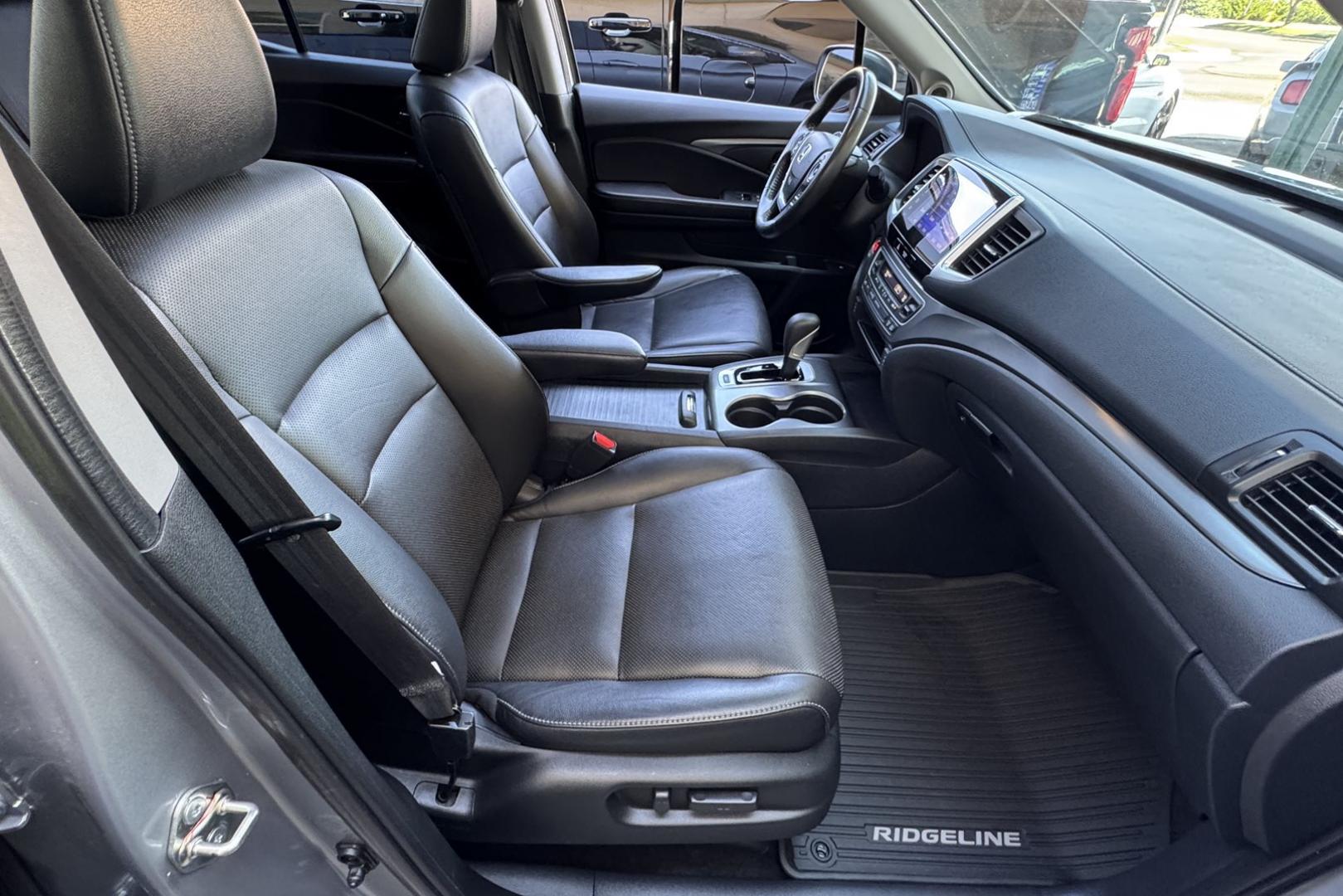 2019 Silver /Black Honda Ridgeline RTL-T (5FPYK3F67KB) with an V6 3.5 Liter engine, Automatic 6 Speed transmission, located at 2304 W. Main St., Boise, ID, 83702, (208) 342-7777, 43.622105, -116.218658 - Photo#14