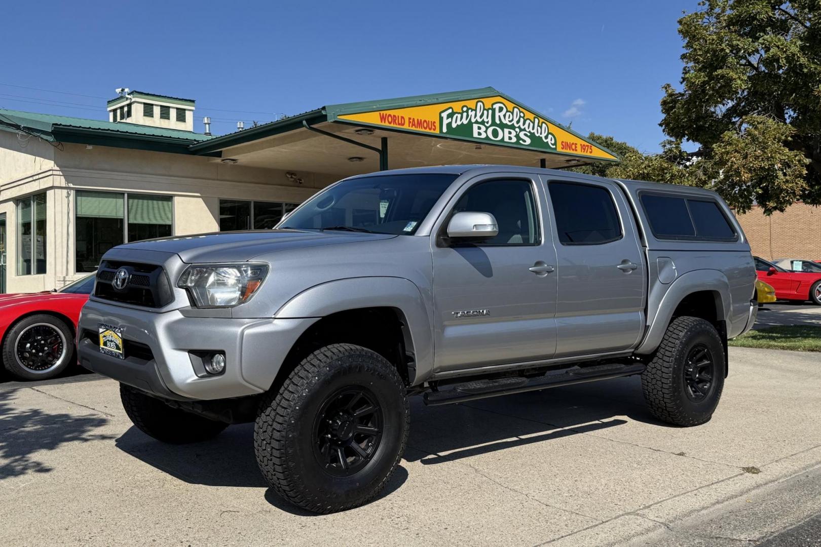 2014 Silver /Gray Toyota Tacoma SR5 (5TFLU4EN2EX) with an V6 4.0 Liter engine, Automatic transmission, located at 2304 W. Main St., Boise, ID, 83702, (208) 342-7777, 43.622105, -116.218658 - New Wheels And Tires! Matching Shell! Clean Toyota! - Photo#0