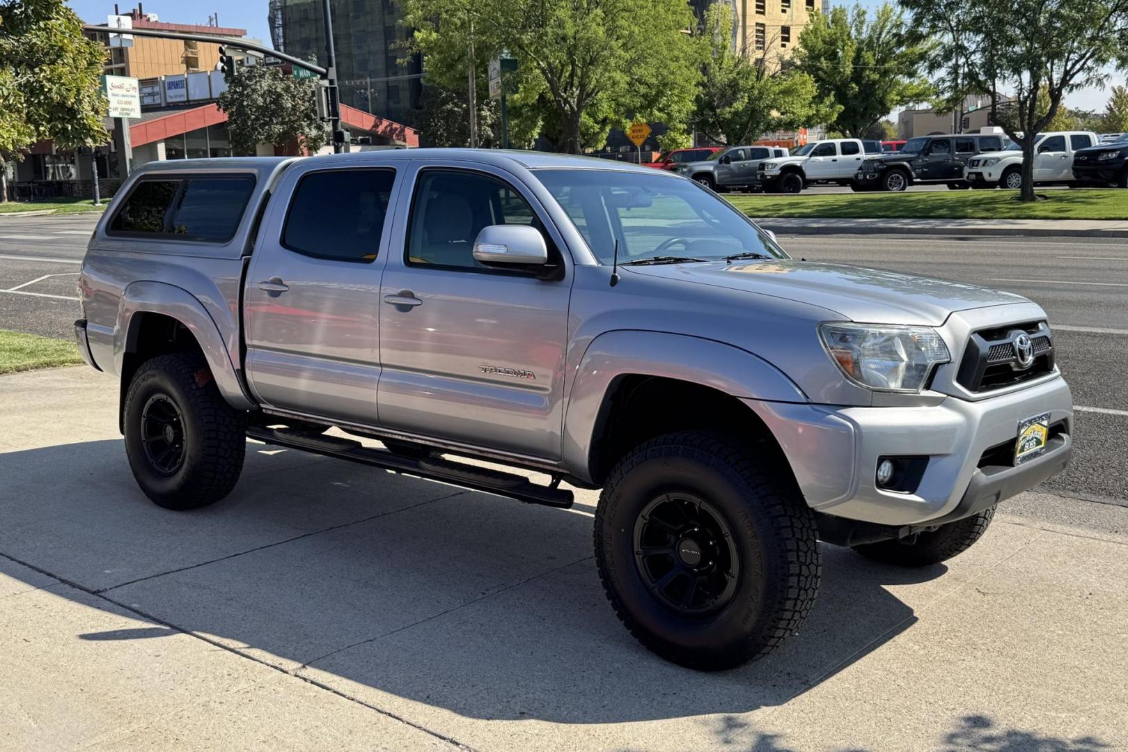 2014 Silver /Gray Toyota Tacoma SR5 (5TFLU4EN2EX) with an V6 4.0 Liter engine, Automatic transmission, located at 2304 W. Main St., Boise, ID, 83702, (208) 342-7777, 43.622105, -116.218658 - New Wheels And Tires! Matching Shell! Clean Toyota! - Photo#2