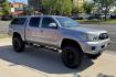 2014 Silver /Gray Toyota Tacoma SR5 (5TFLU4EN2EX) with an V6 4.0 Liter engine, Automatic transmission, located at 2304 W. Main St., Boise, ID, 83702, (208) 342-7777, 43.622105, -116.218658 - New Wheels And Tires! Matching Shell! Clean Toyota! - Photo#2
