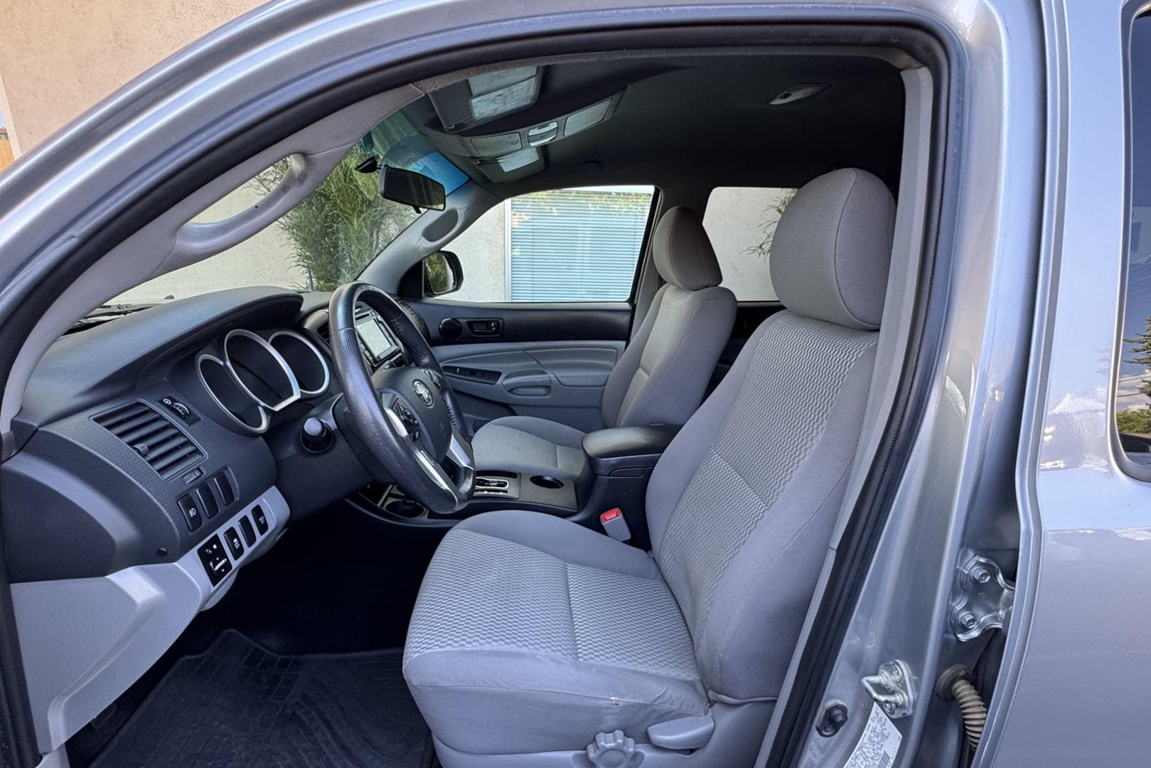 2014 Silver /Gray Toyota Tacoma SR5 (5TFLU4EN2EX) with an V6 4.0 Liter engine, Automatic transmission, located at 2304 W. Main St., Boise, ID, 83702, (208) 342-7777, 43.622105, -116.218658 - New Wheels And Tires! Matching Shell! Clean Toyota! - Photo#6