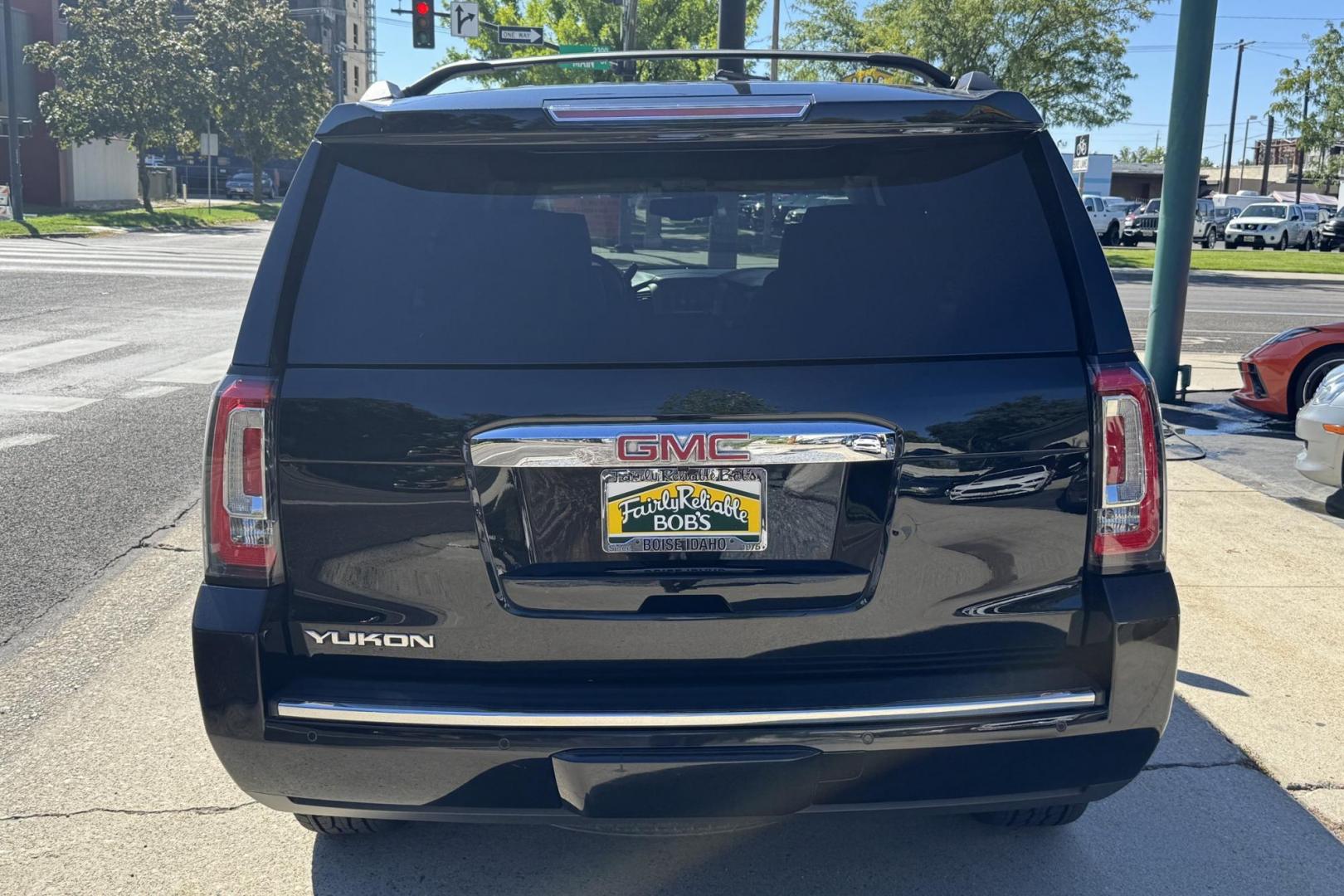 2015 Black /Jet Black GMC Yukon Denali (1GKS2CKJ2FR) with an V8 6.2 Liter engine, Automatic 8 Speed transmission, located at 2304 W. Main St., Boise, ID, 83702, (208) 342-7777, 43.622105, -116.218658 - Well Optioned! Clean With New Tires Too! - Photo#1