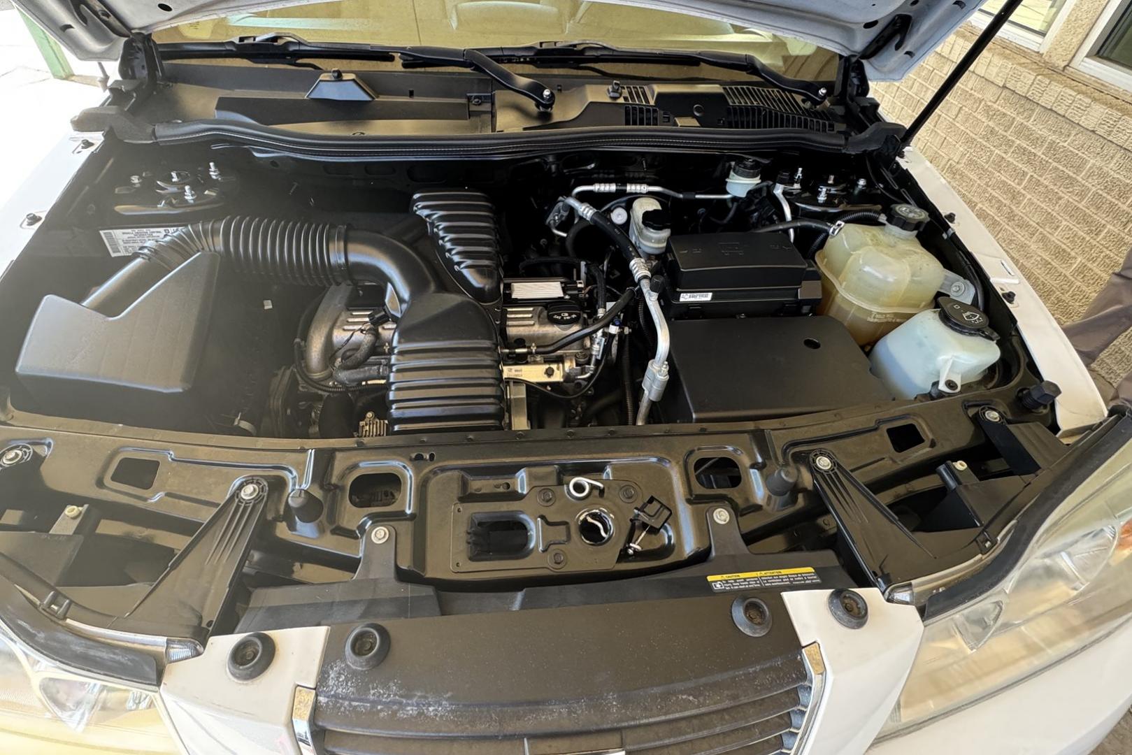 2006 White /Gray Saturn Vue (5GZCZ23DX6S) with an 4 Cyl 2.2 Liter engine, 5 Speed Manual transmission, located at 2304 W. Main St., Boise, ID, 83702, (208) 342-7777, 43.622105, -116.218658 - Clean One Owner Idaho Vehicle! - Photo#12