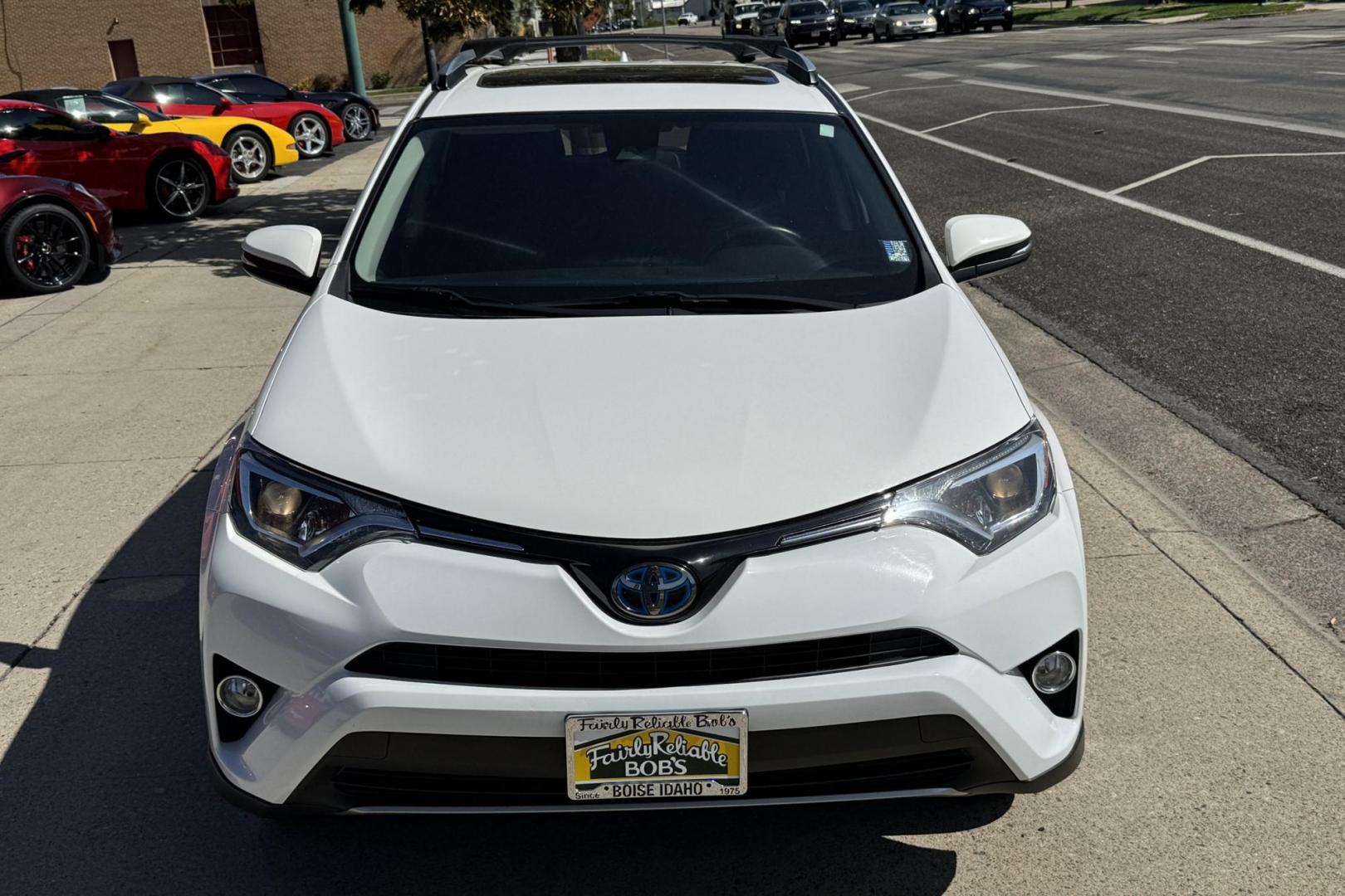 2018 White /Black Toyota RAV4 XLE (JTMRJREV5JD) with an 4 Cyl 2.5 Liter Hybrid engine, Automatic transmission, located at 2304 W. Main St., Boise, ID, 83702, (208) 342-7777, 43.622105, -116.218658 - Hybrid All Wheel Drive RAV4! Ready To Go! - Photo#4
