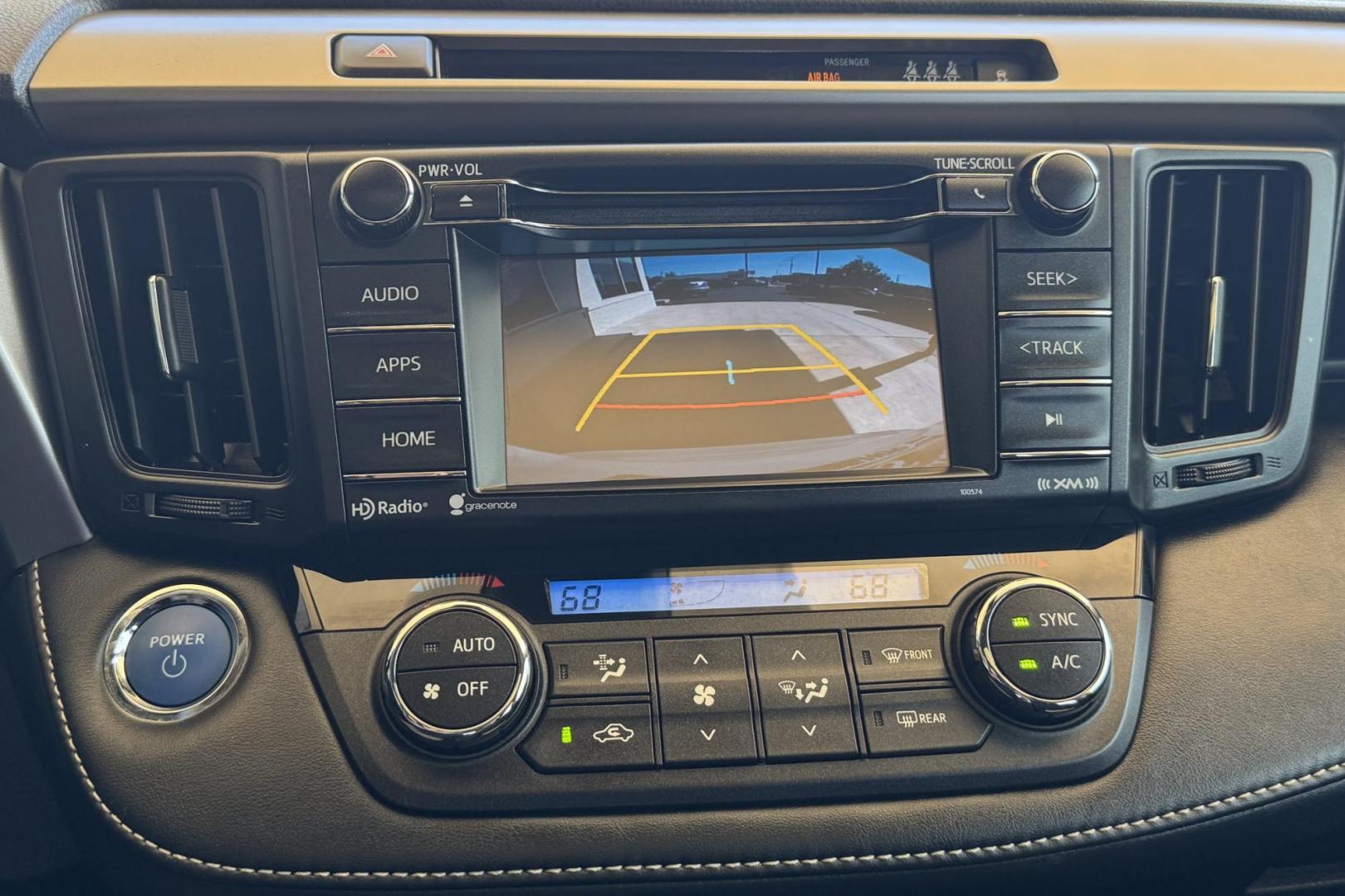 2018 White /Black Toyota RAV4 XLE (JTMRJREV5JD) with an 4 Cyl 2.5 Liter Hybrid engine, Automatic transmission, located at 2304 W. Main St., Boise, ID, 83702, (208) 342-7777, 43.622105, -116.218658 - Hybrid All Wheel Drive RAV4! Ready To Go! - Photo#5