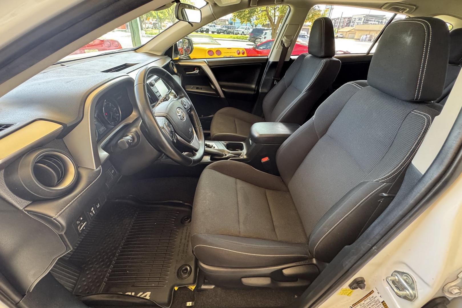 2018 White /Black Toyota RAV4 XLE (JTMRJREV5JD) with an 4 Cyl 2.5 Liter Hybrid engine, Automatic transmission, located at 2304 W. Main St., Boise, ID, 83702, (208) 342-7777, 43.622105, -116.218658 - Hybrid All Wheel Drive RAV4! Ready To Go! - Photo#6