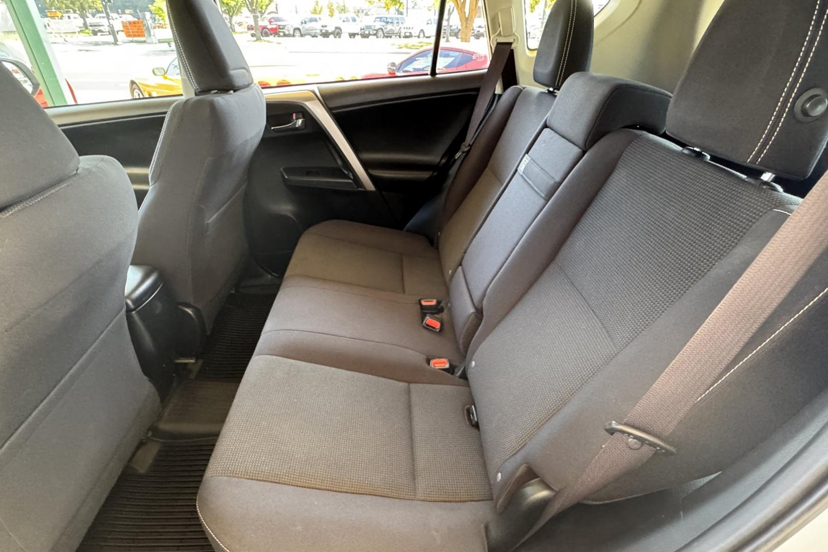 2018 White /Black Toyota RAV4 XLE (JTMRJREV5JD) with an 4 Cyl 2.5 Liter Hybrid engine, Automatic transmission, located at 2304 W. Main St., Boise, ID, 83702, (208) 342-7777, 43.622105, -116.218658 - Hybrid All Wheel Drive RAV4! Ready To Go! - Photo#11