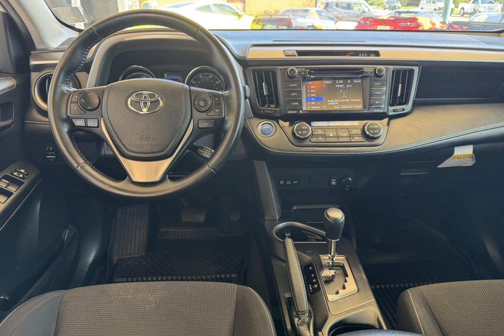 2018 White /Black Toyota RAV4 XLE (JTMRJREV5JD) with an 4 Cyl 2.5 Liter Hybrid engine, Automatic transmission, located at 2304 W. Main St., Boise, ID, 83702, (208) 342-7777, 43.622105, -116.218658 - Hybrid All Wheel Drive RAV4! Ready To Go! - Photo#12