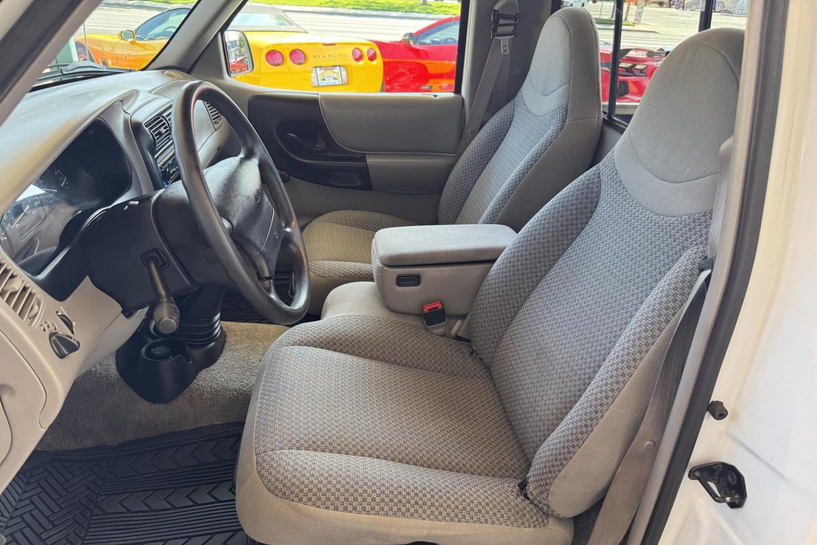 1998 White /Gray Ford Ranger XLT (1FTYR10C5WU) with an 4 Cyl 2.5 Liter engine, 5 Speed transmission, located at 2304 W. Main St., Boise, ID, 83702, (208) 342-7777, 43.622105, -116.218658 - New Tires! Low Mileage! Ready To Go! - Photo#5