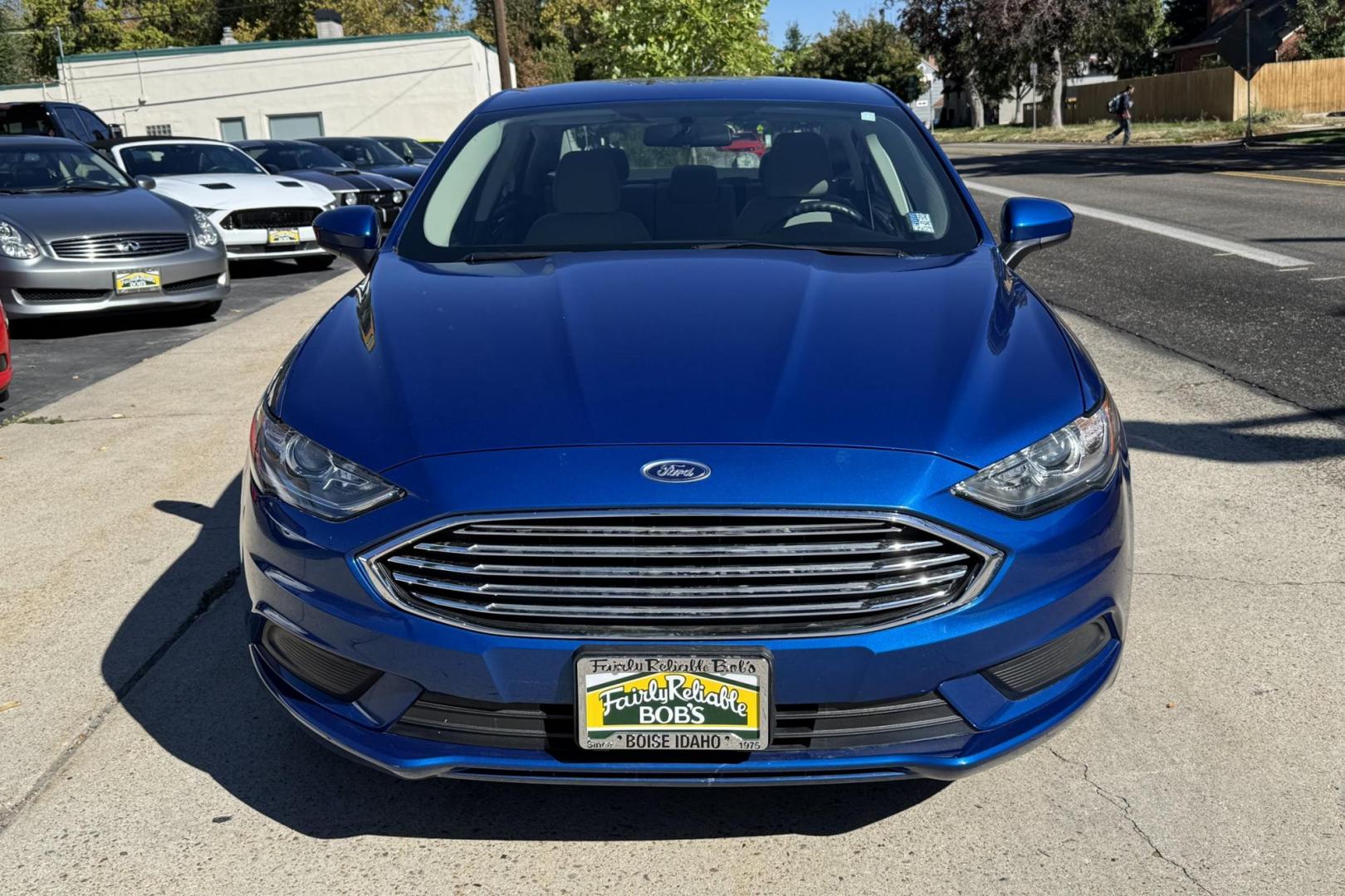 2018 Blue Lightning Metallic /Gray Ford Fusion (3FA6P0UU3JR) with an 4 Cyl 2.0 Liter Hybrid engine, Automatic transmission, located at 2304 W. Main St., Boise, ID, 83702, (208) 342-7777, 43.622105, -116.218658 - Great Fuel Economy! Smooth Ride Too! - Photo#3