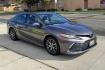 2024 Predawn Mica Gray /Black Toyota Camry XLE (4T1F11AK9RU) with an 4 Cyl 2.5 Liter engine, Automatic 8 Speed transmission, located at 2304 W. Main St., Boise, ID, 83702, (208) 342-7777, 43.622105, -116.218658 - Heated Seats! Heated Steering Wheel & Sunroof Too! - Photo#2