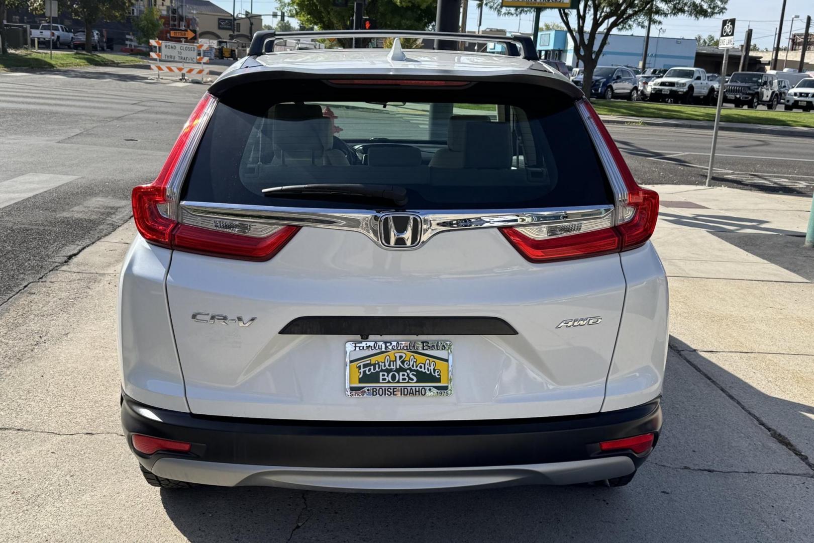 2019 Pearl White /Tan Honda CR-V LX (5J6RW6H30KL) with an 4 Cyl 2.4 Liter engine, Automatic transmission, located at 2304 W. Main St., Boise, ID, 83702, (208) 342-7777, 43.622105, -116.218658 - Great All Wheel Drive Option! - Photo#1