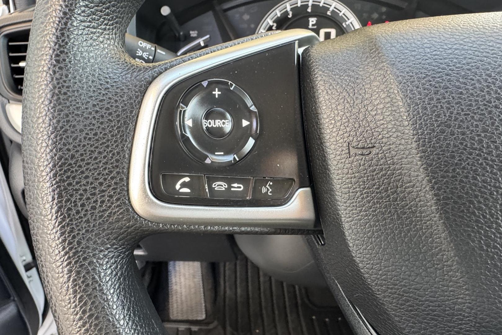 2019 Pearl White /Tan Honda CR-V LX (5J6RW6H30KL) with an 4 Cyl 2.4 Liter engine, Automatic transmission, located at 2304 W. Main St., Boise, ID, 83702, (208) 342-7777, 43.622105, -116.218658 - Great All Wheel Drive Option! - Photo#5