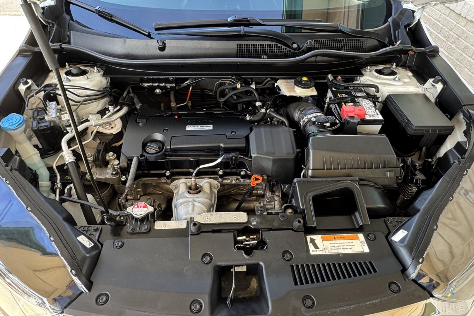 2019 Pearl White /Tan Honda CR-V LX (5J6RW6H30KL) with an 4 Cyl 2.4 Liter engine, Automatic transmission, located at 2304 W. Main St., Boise, ID, 83702, (208) 342-7777, 43.622105, -116.218658 - Great All Wheel Drive Option! - Photo#12
